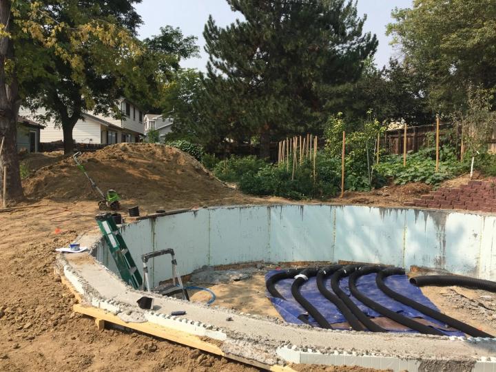 climate battery earth tubes being installed