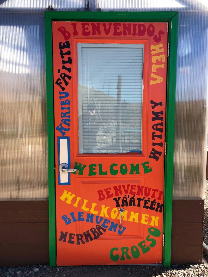 bilangual artistic greenhouse door