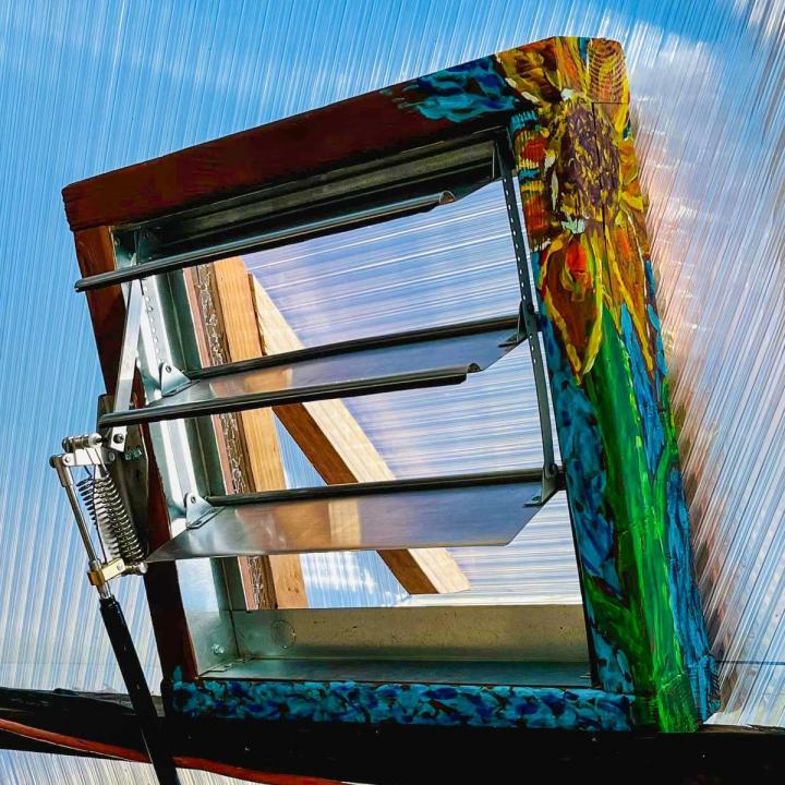close up interior photo of a vented frame pollinator window