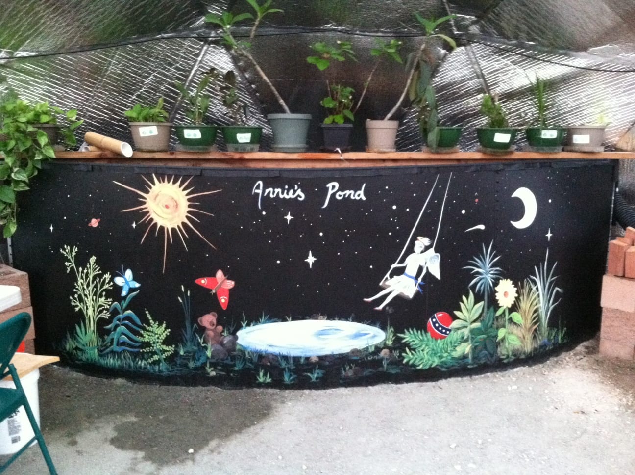 Annie's Pond a painted above grown pond in a greenhouse at littleton academy 