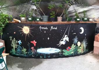 Annie's Pond a painted above grown pond in a greenhouse at littleton academy