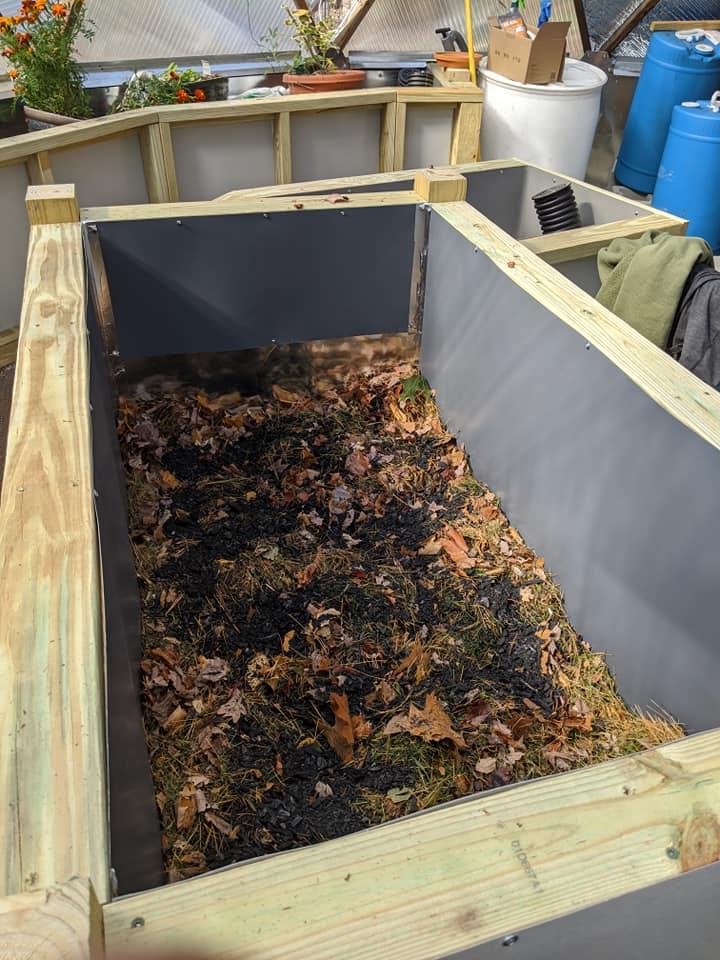 Hugelkultur in Growing Dome Greenhouse with dead leaves