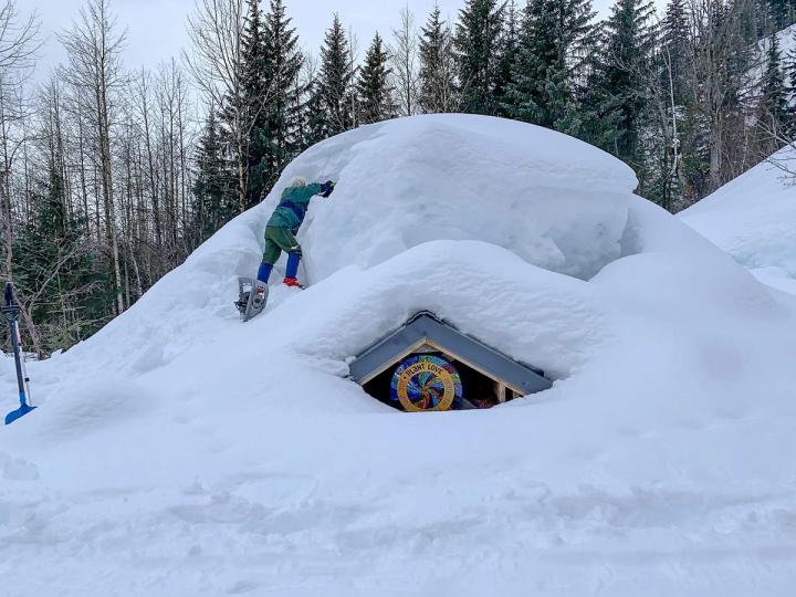 greenhouse ion Alaska covered in 6ft of snow