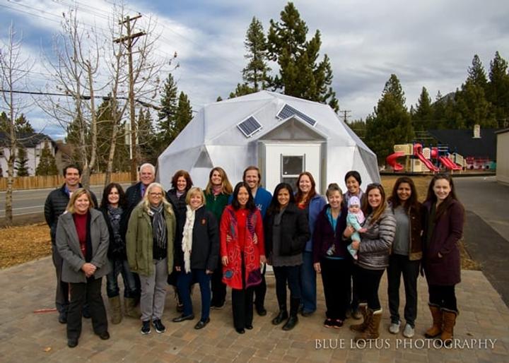 School Staff celebrating the construction of Dome greenhouse