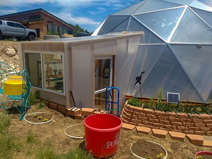 Custom air-lock and storage for geodesic greenhouse