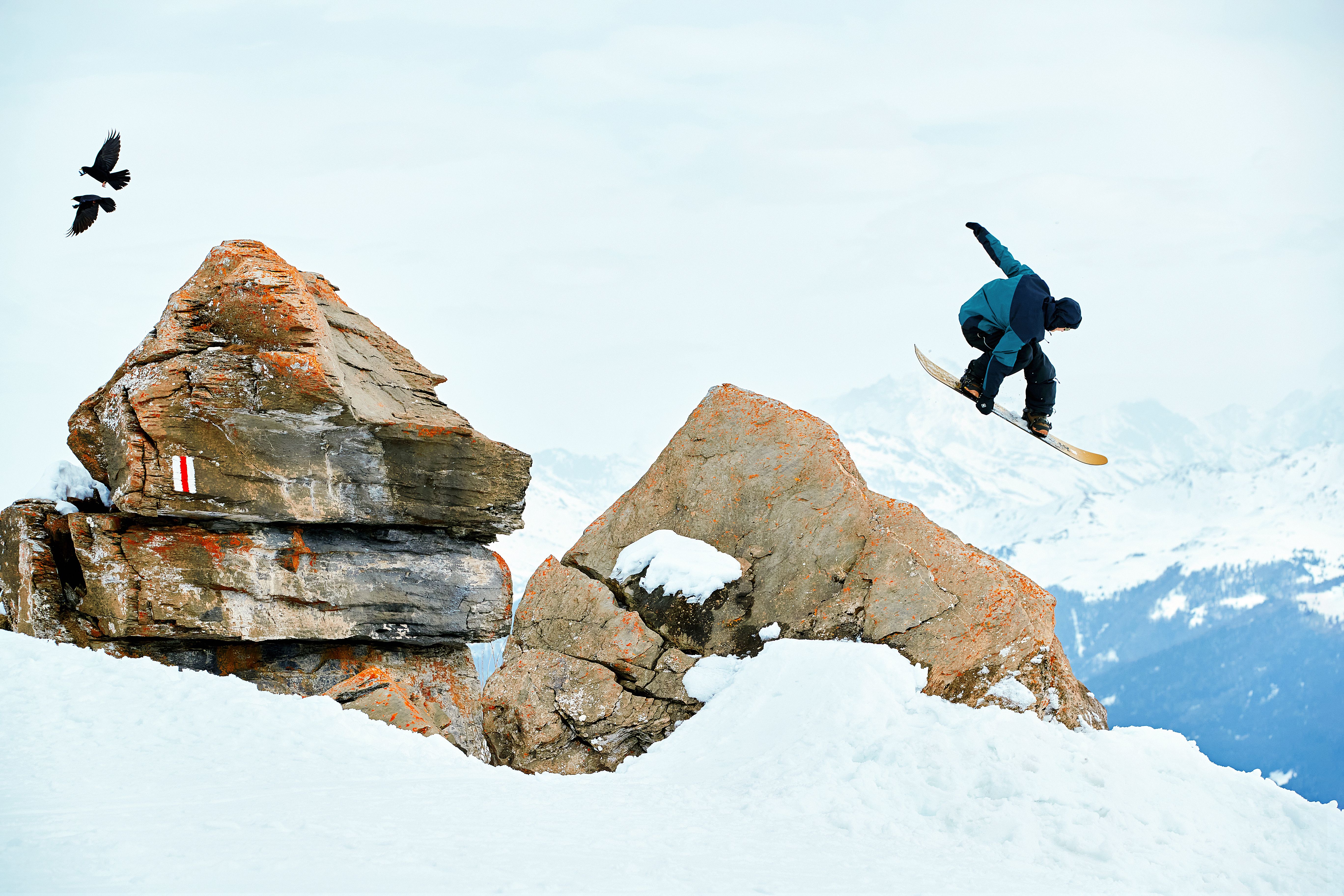Snowboarder DC jumping