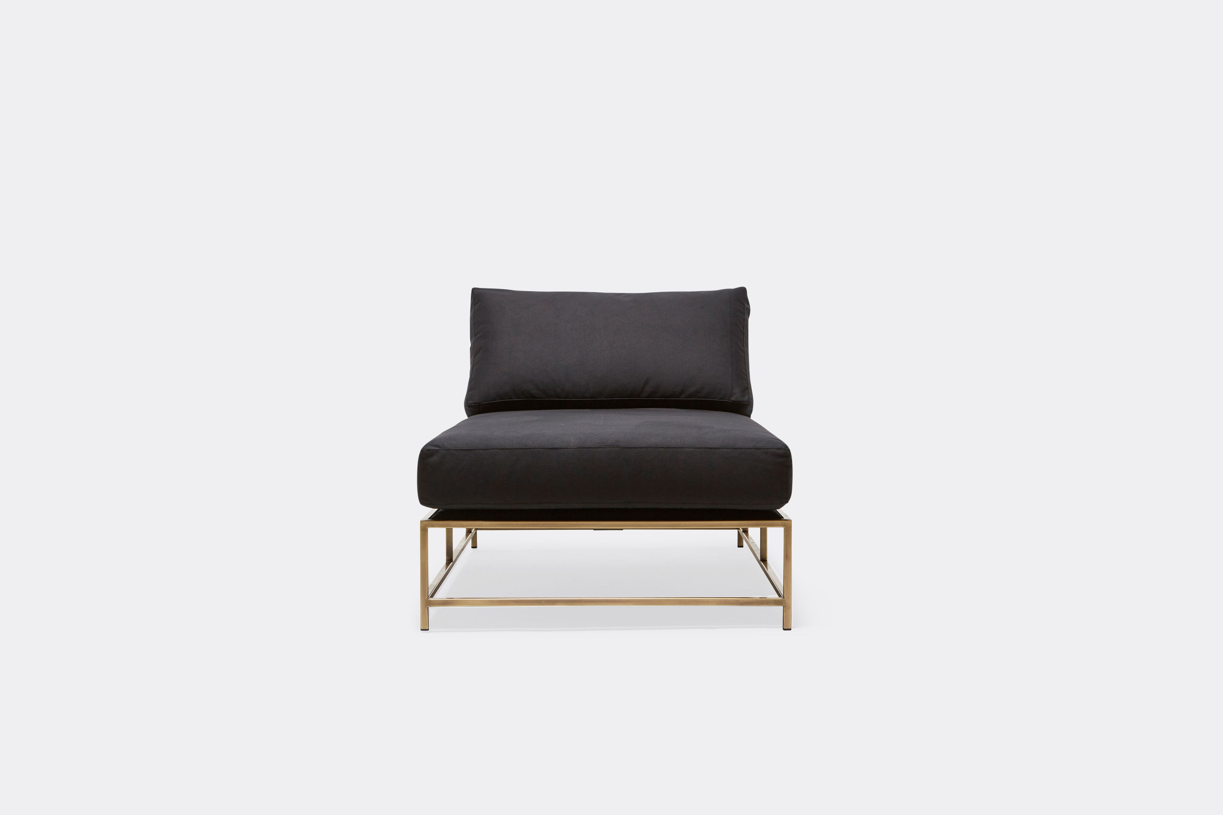 front of Chaise Lounge with black canvas upholstery and antique brass metal frame