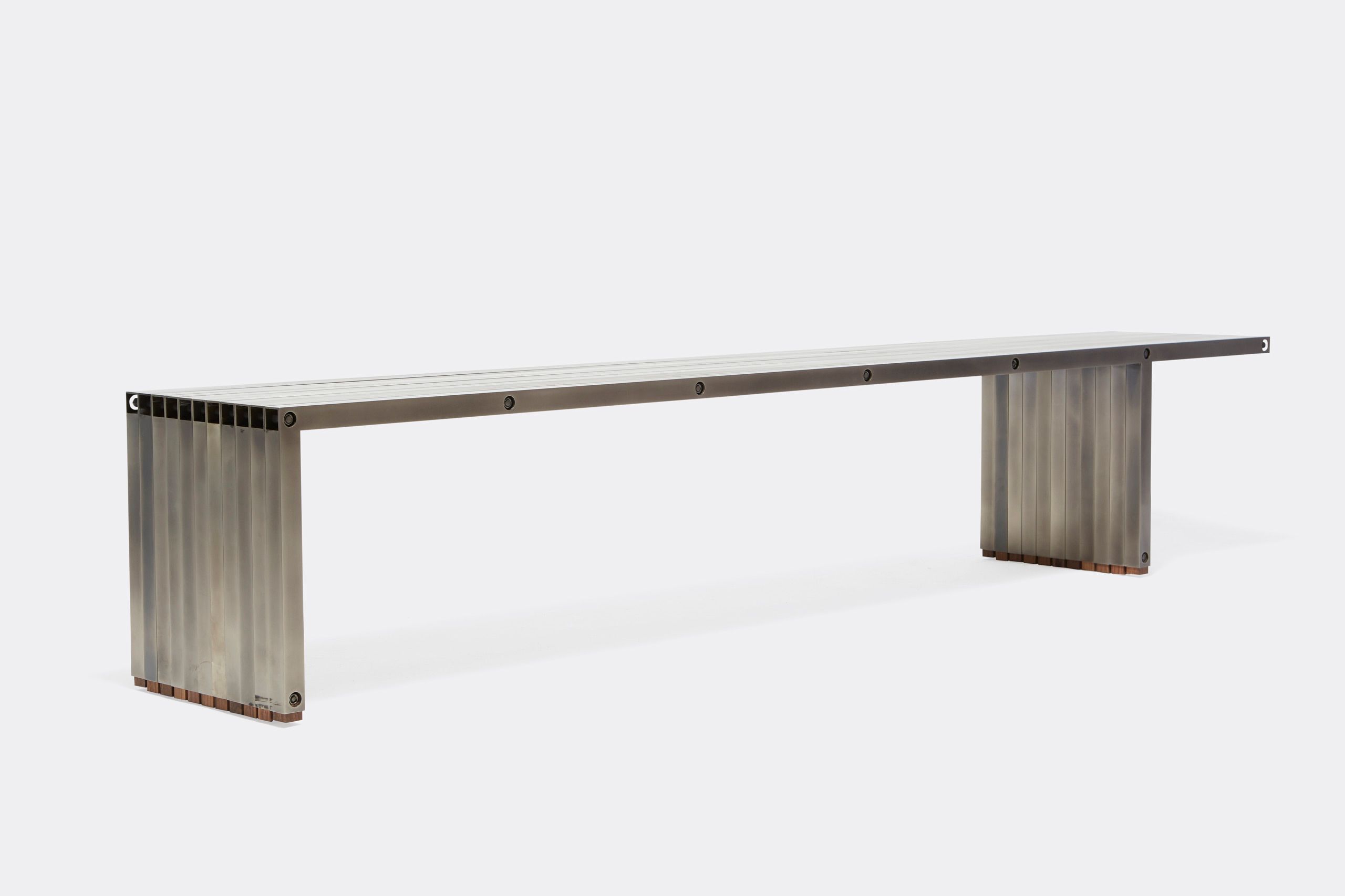 a steel bench shown on a white background .