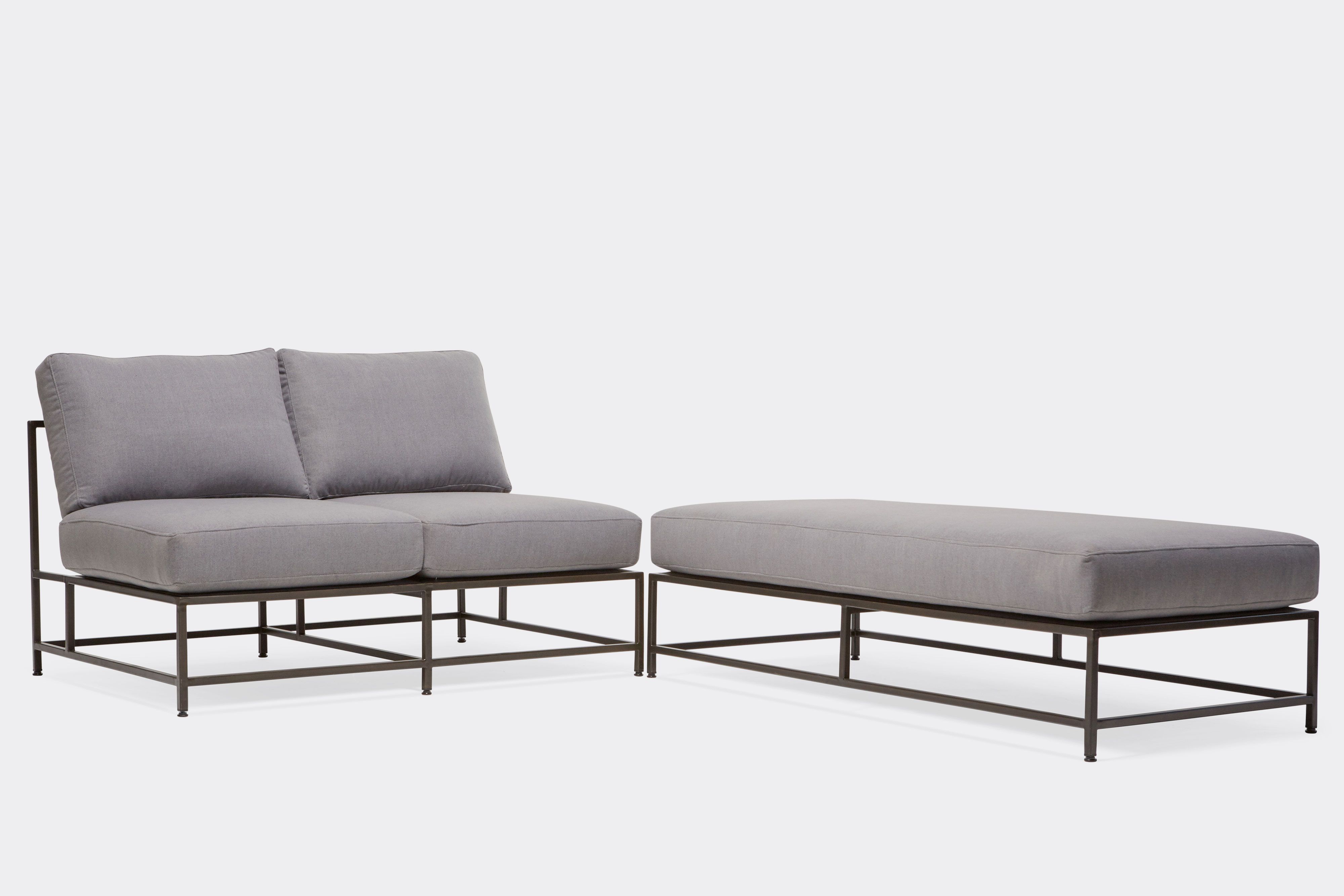 front of sectional with grey wool upholstery on blackened steel metal frame