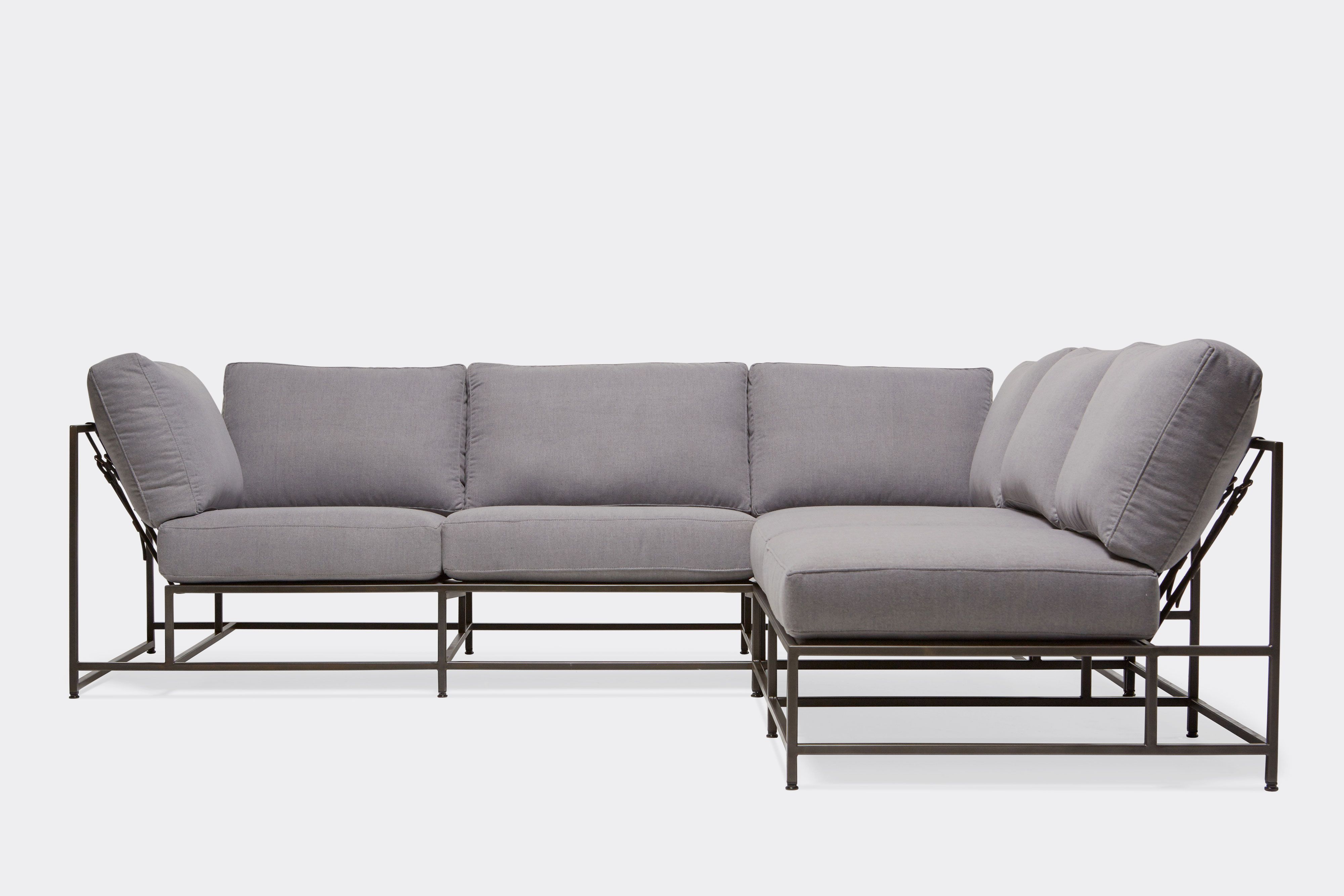 front of sectional with grey wool upholstery on blackened steel metal frame