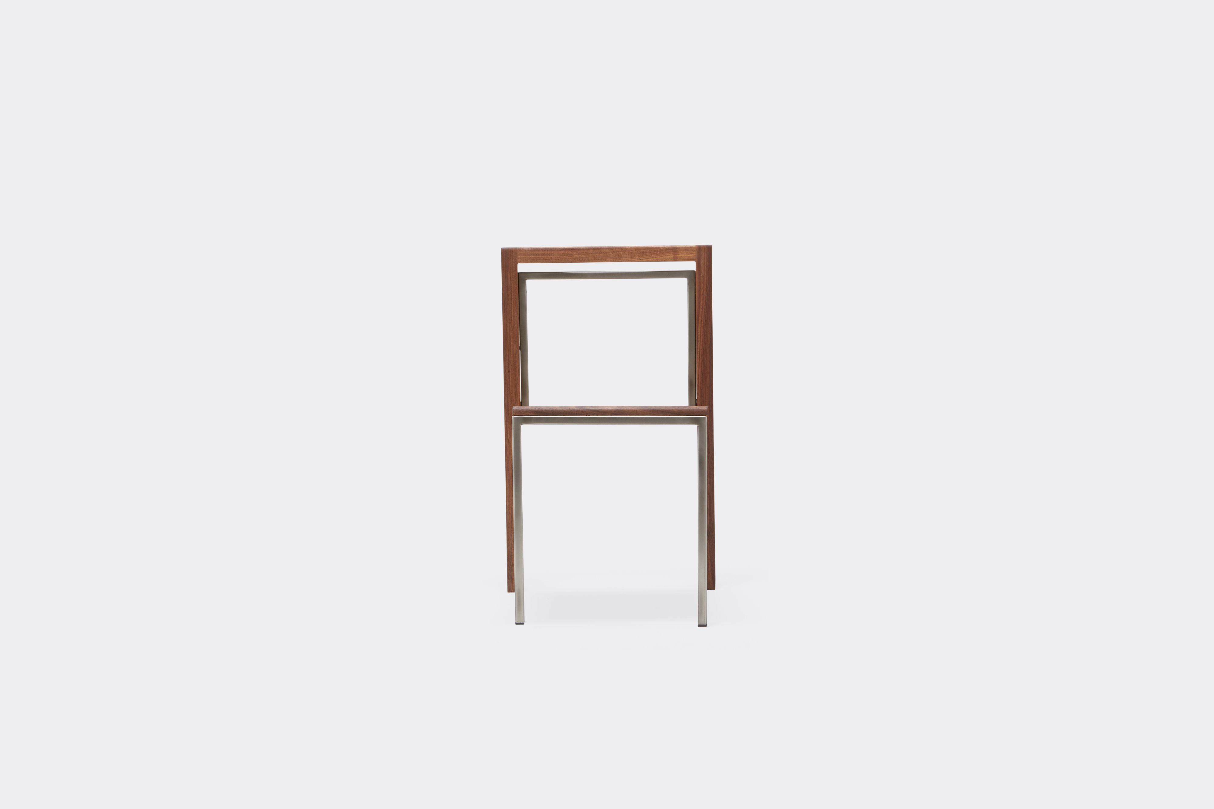 Back view of walnut and antique nickel dining chair