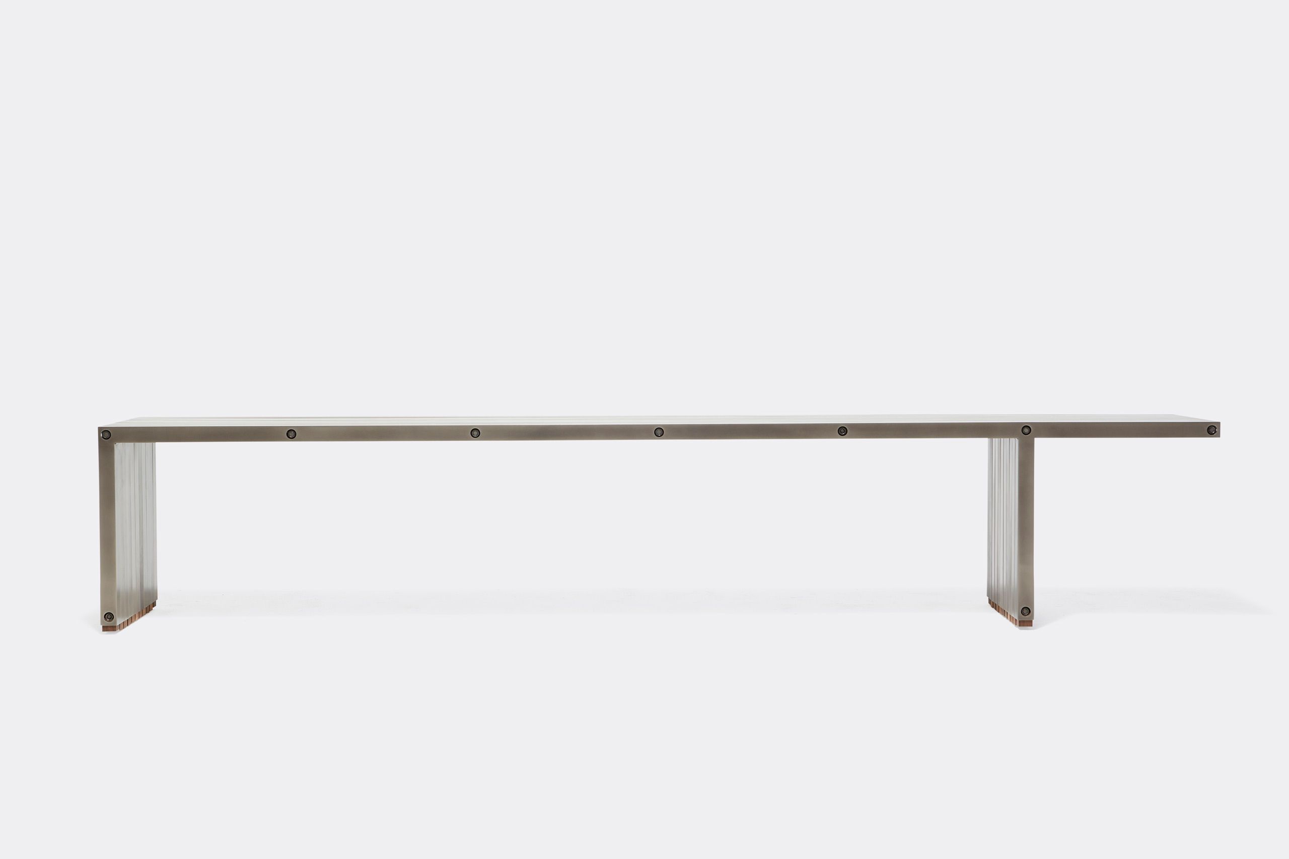 a steel bench shown on a white background .