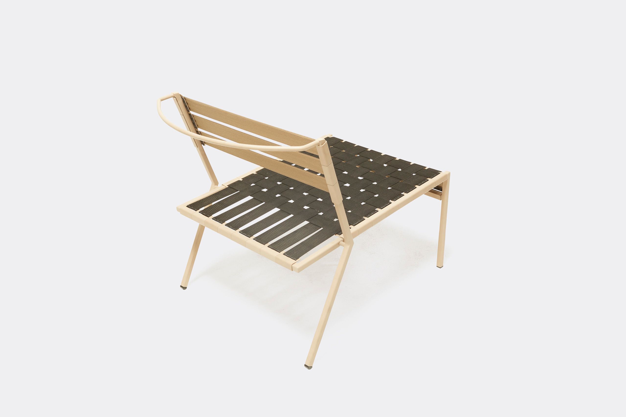 a steel chair with tan powdercoat finish and black interwoven webbing on the seat and back shown on a white background .