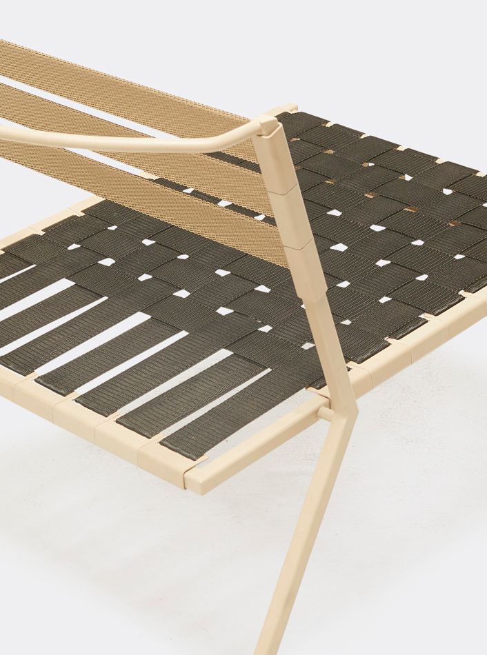 a steel chair with tan powdercoat finish and black interwoven webbing on the seat and back shown on a white background .
