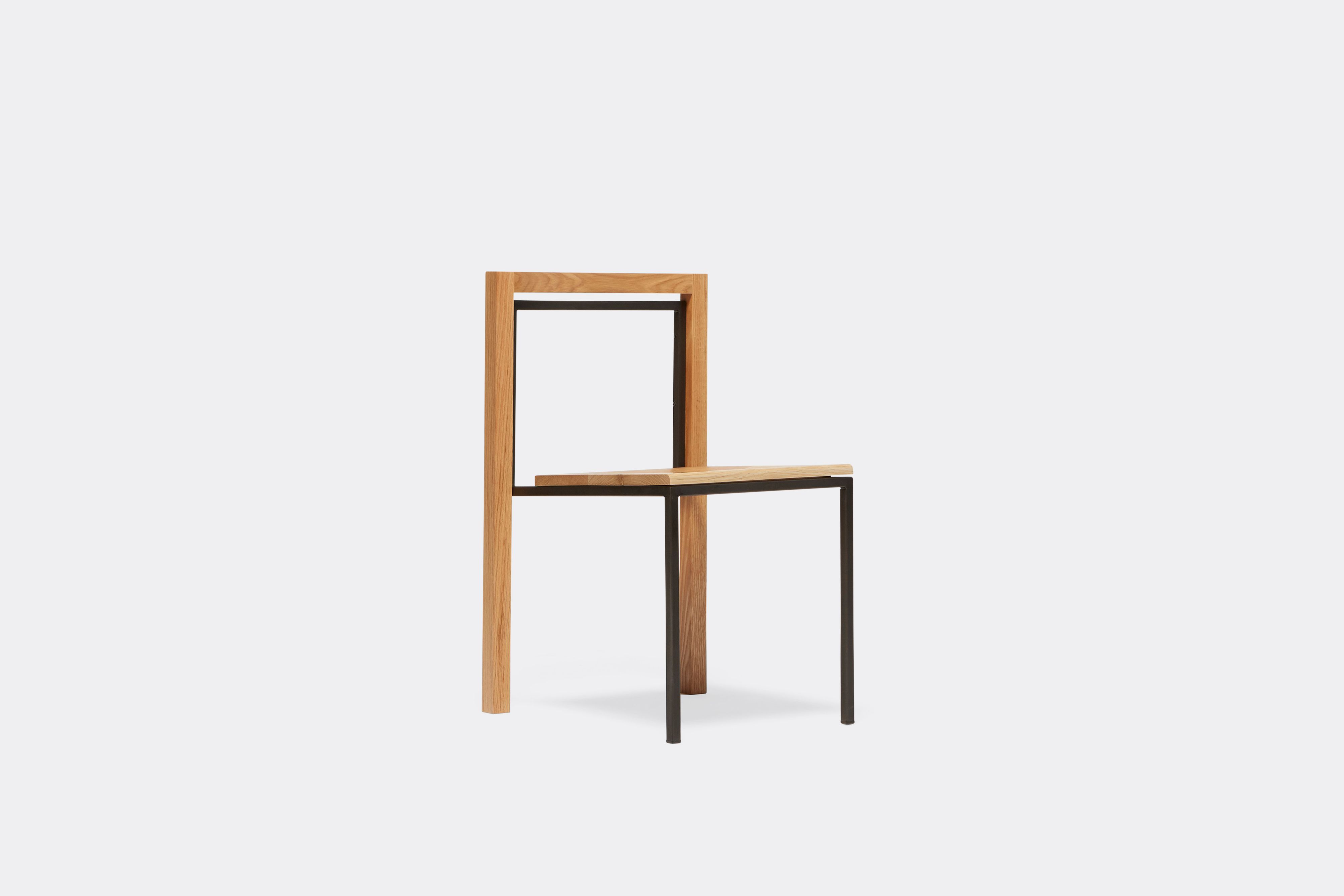 front view of oak and blackened steel dining chair