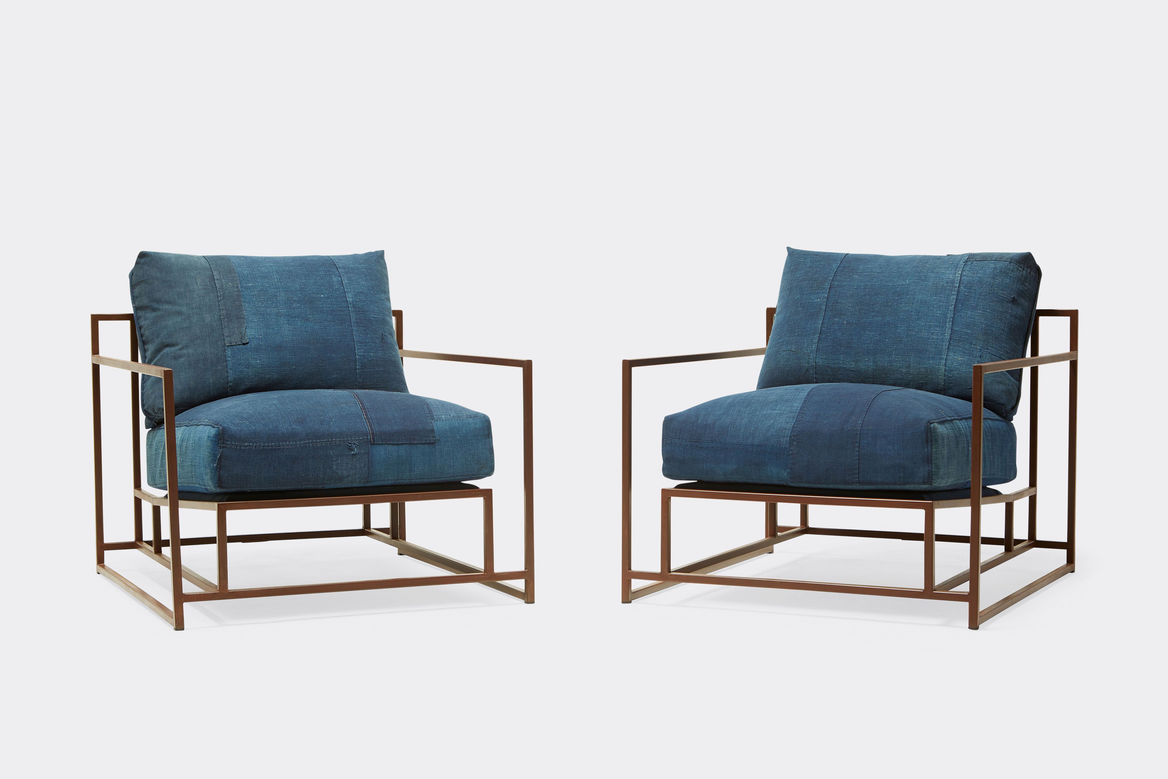 front of two armchairs with vintage boro upholstery on marbled rust metal frame