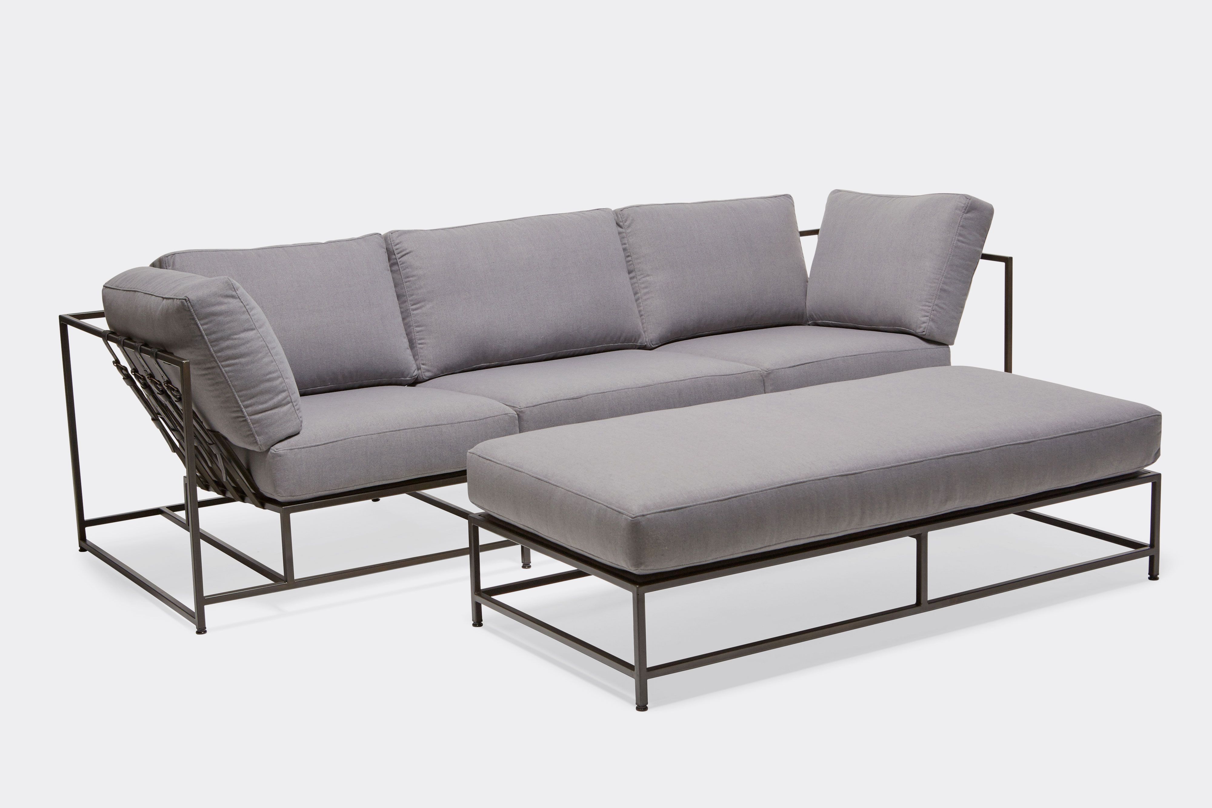 front of sectional with grey wool upholstery on blackened steel metal frame
