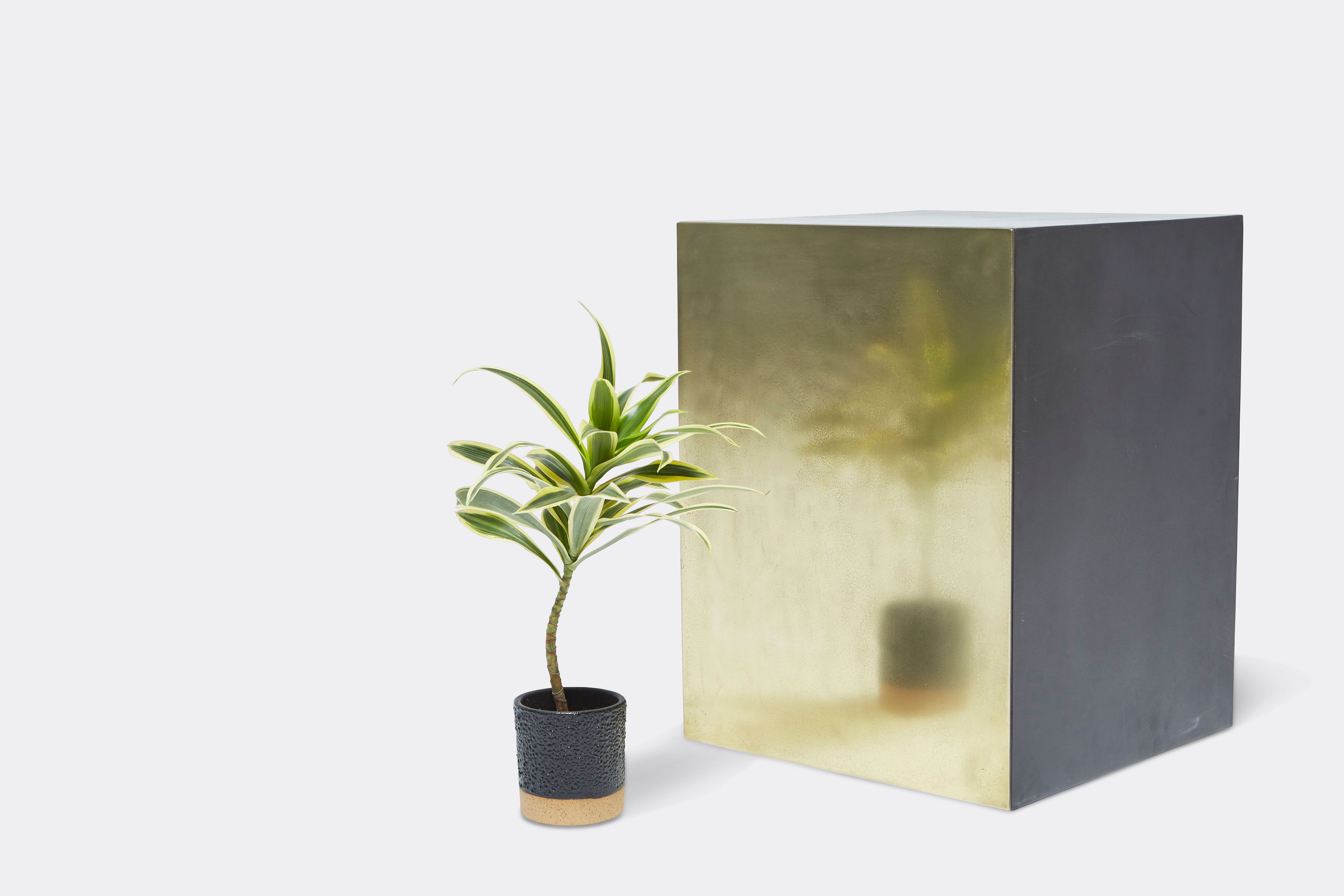 back of block table made with tarnished brass and black metal frame