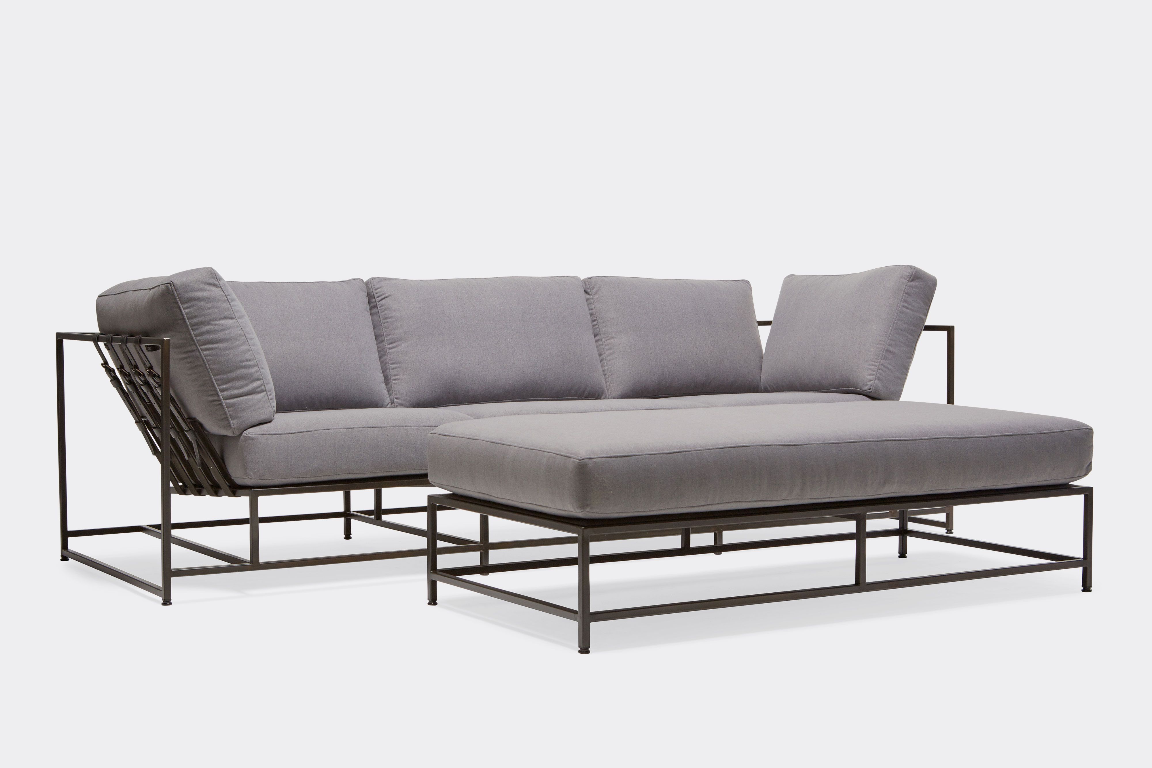front of sectional with grey wool upholstery on blackened steel metal frame