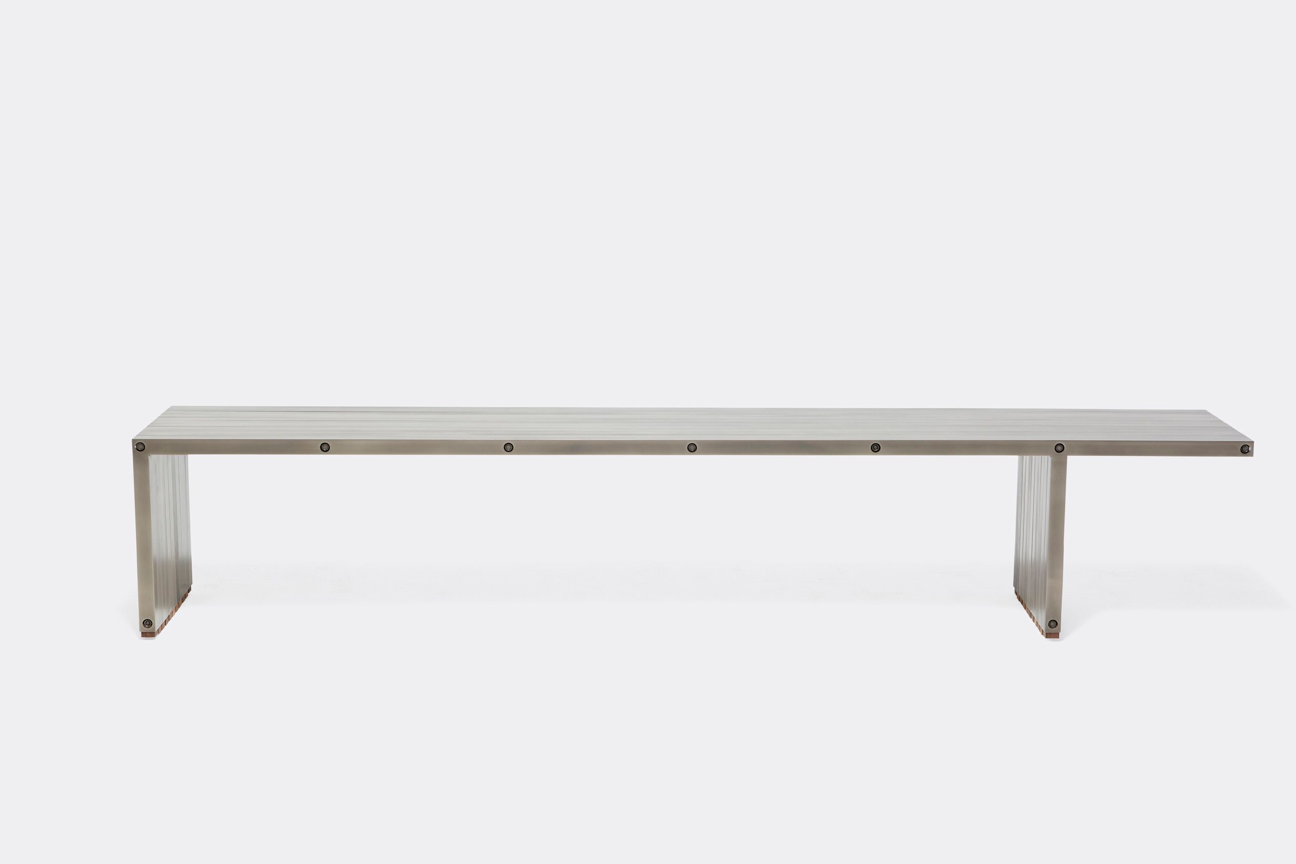 a steel bench shown on a white background .