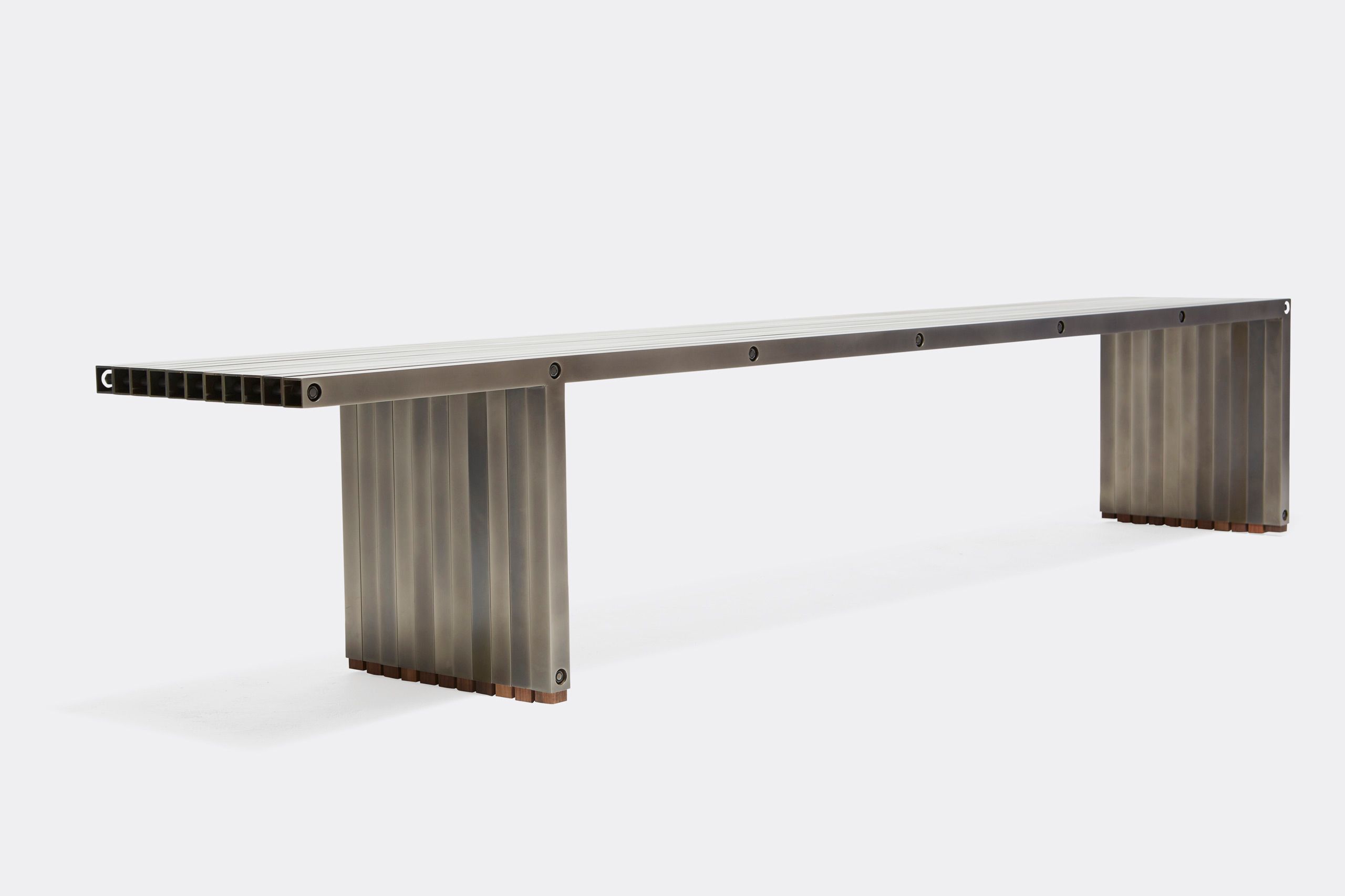 a steel bench shown on a white background .