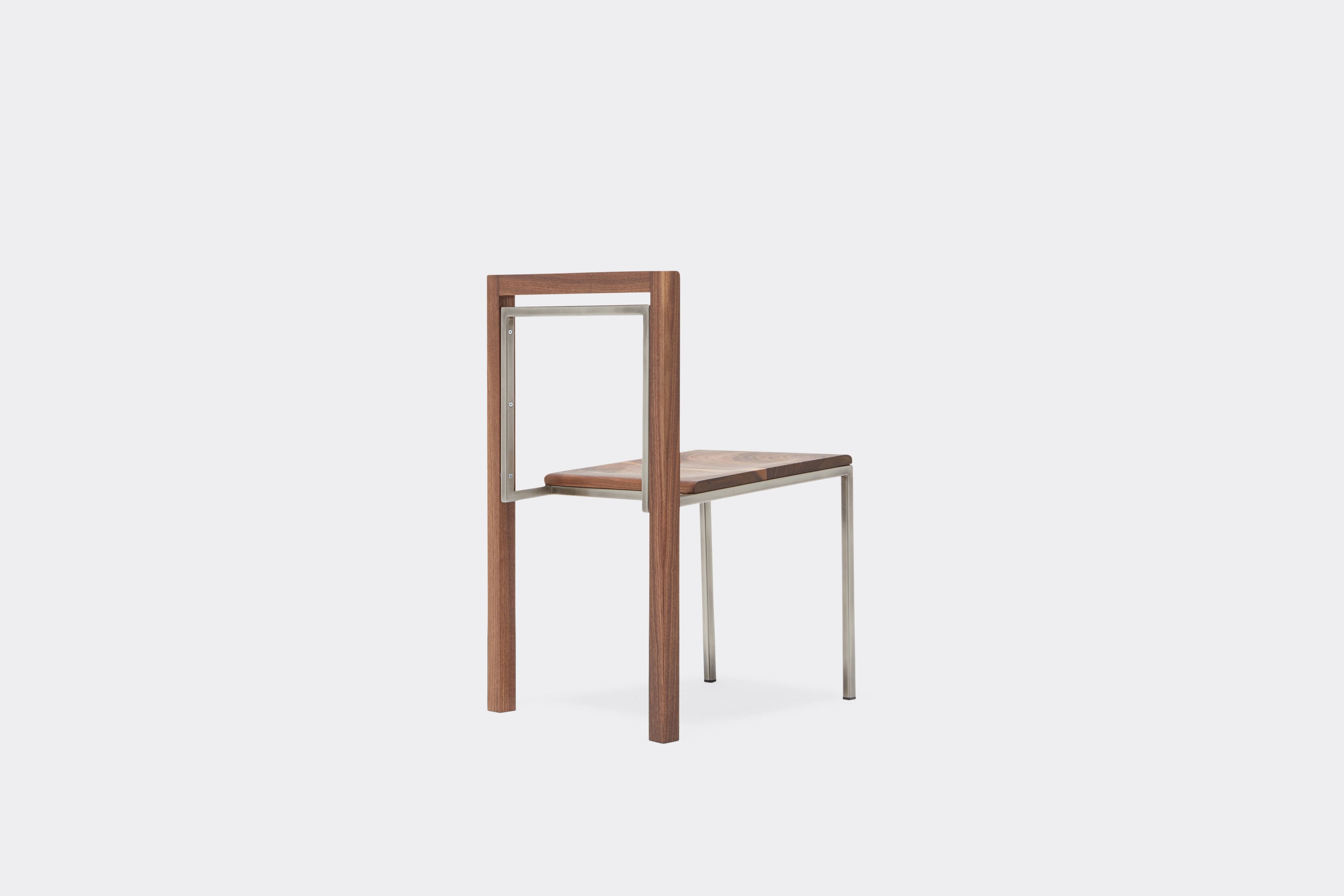 Back view of walnut and antique nickel dining chair