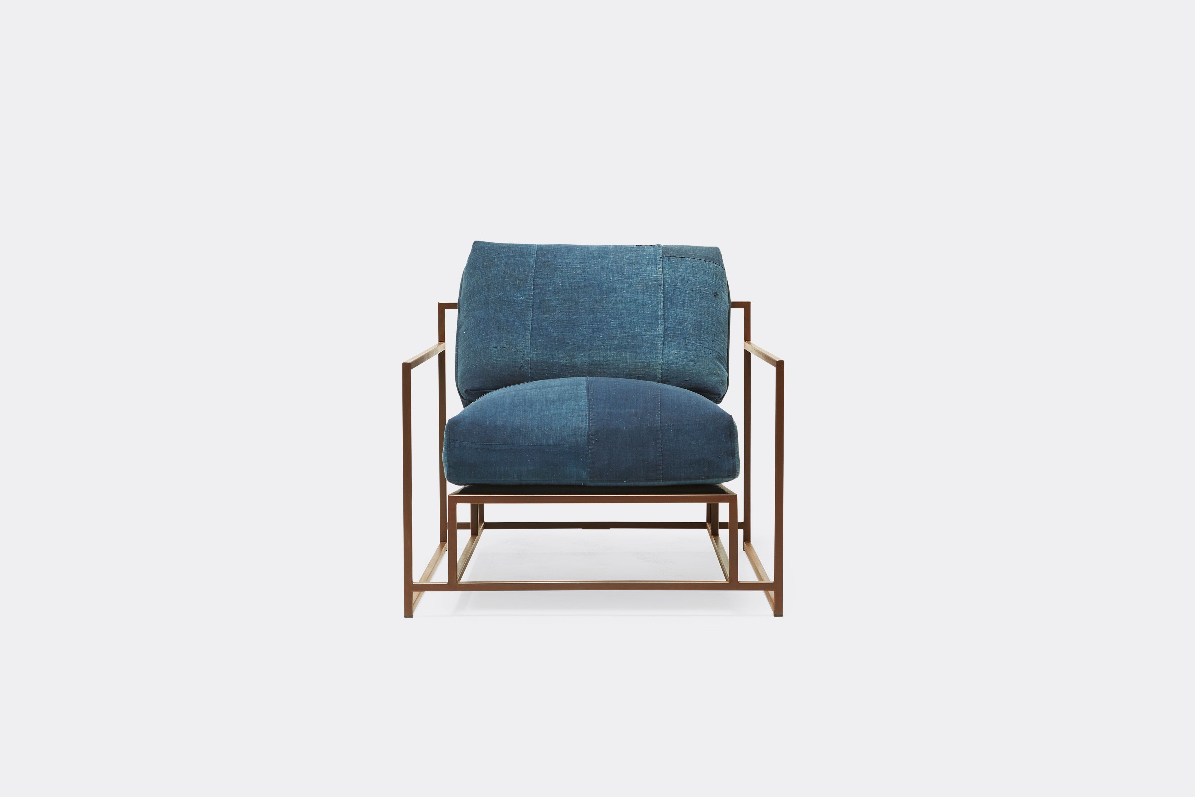 front of armchair with vintage boro upholstery on marbled rust metal frame