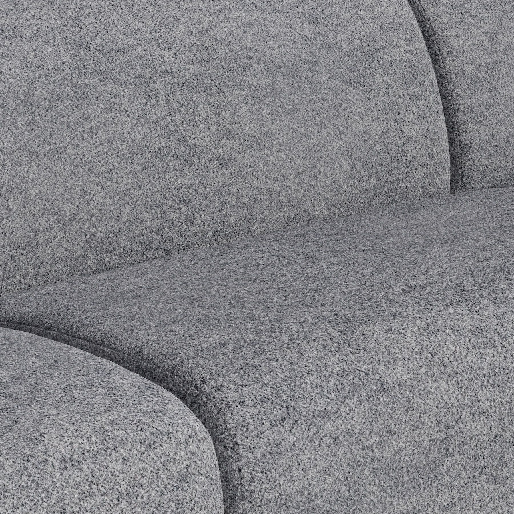 Close-up of a gray textured upholstered sofa.