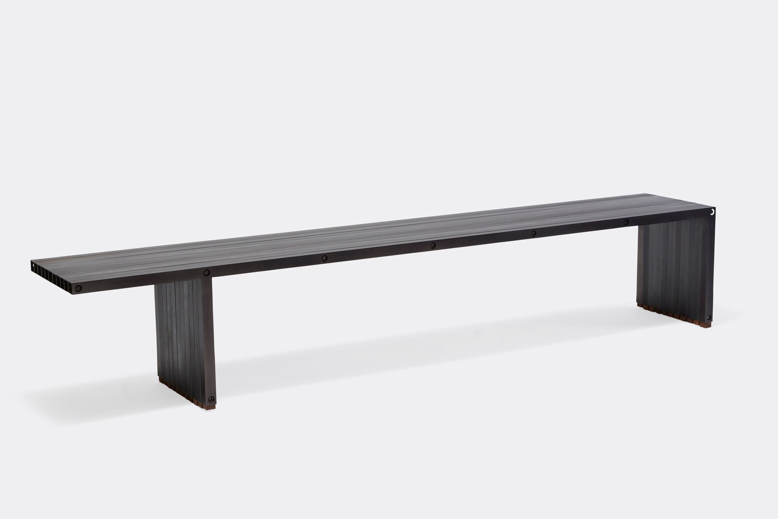 a black aluminum bench on a white background .