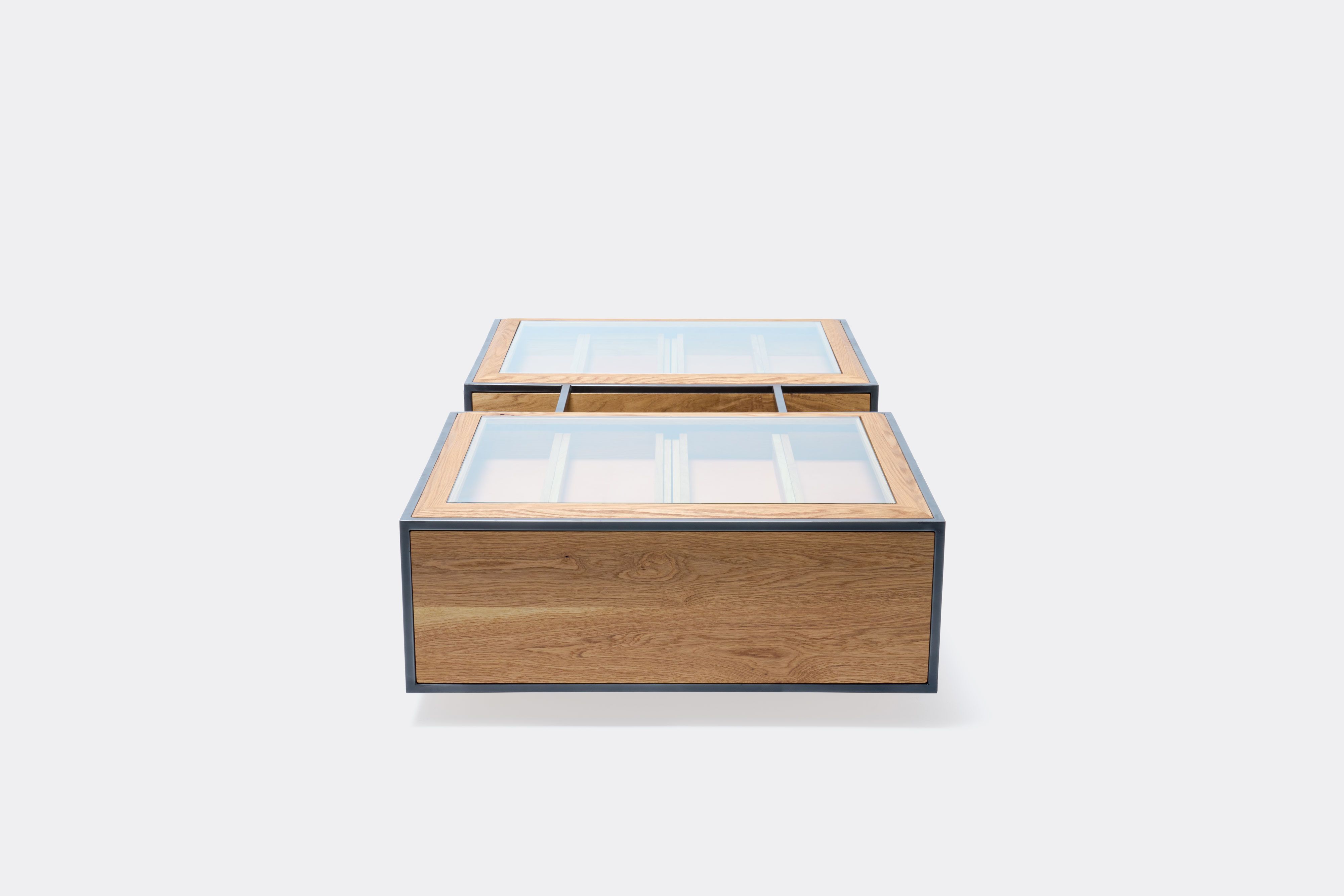 double display coffee table with white oak wood, blackened steel metal and glass top
