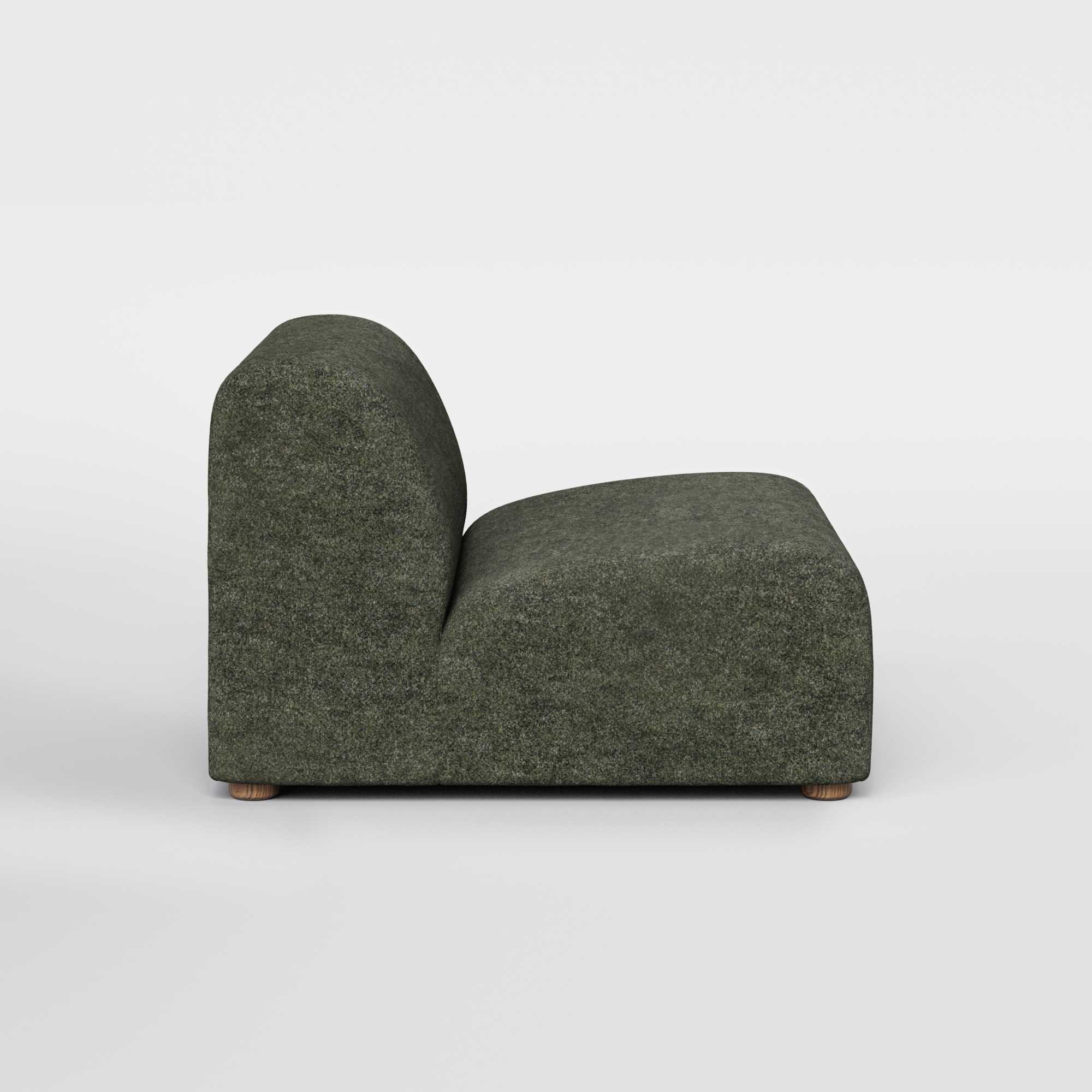 Side view of a dark green upholstered modular lounge chair with rounded edges.