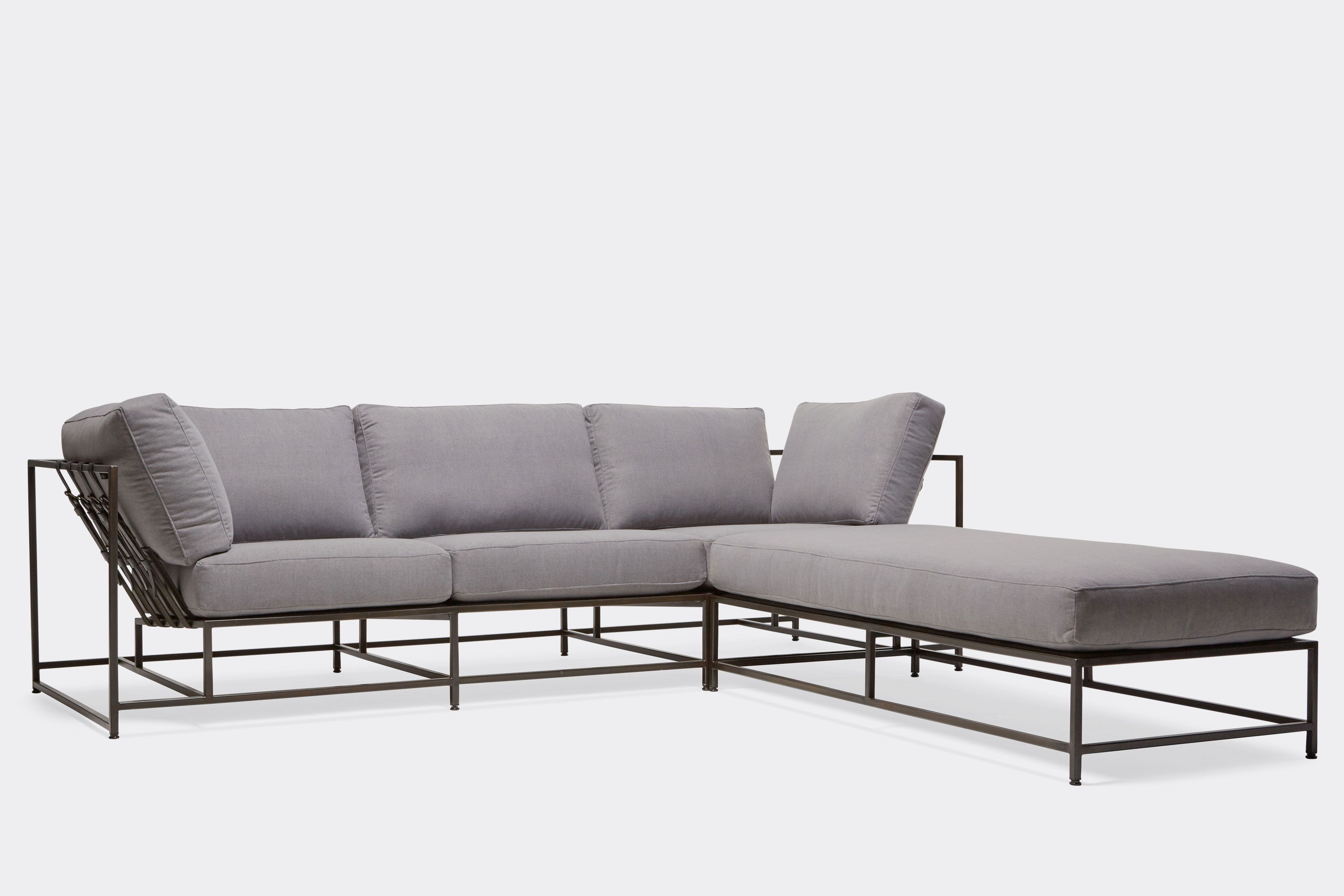front of sectional with grey wool upholstery on blackened steel metal frame