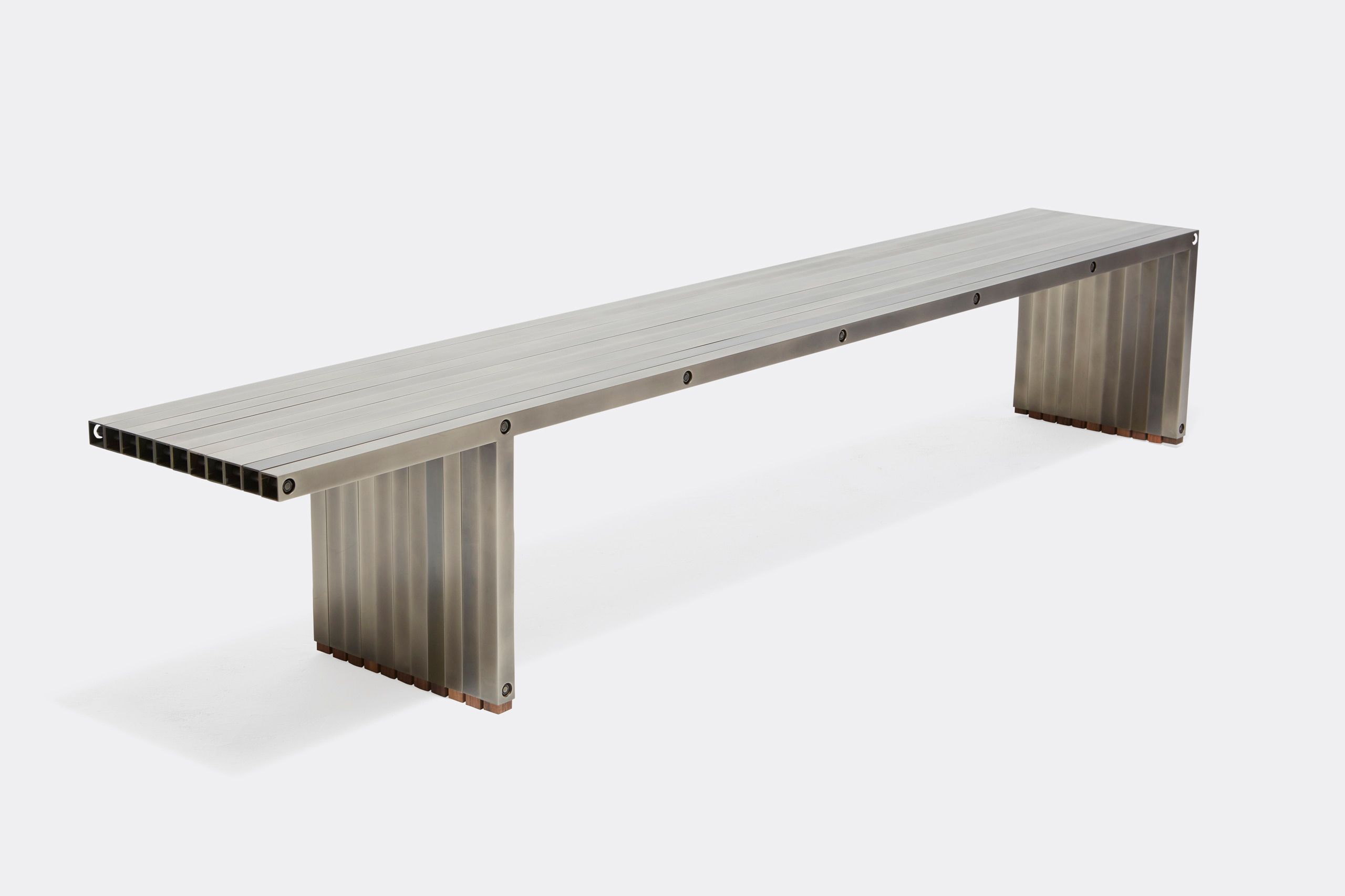 a steel bench shown on a white background .