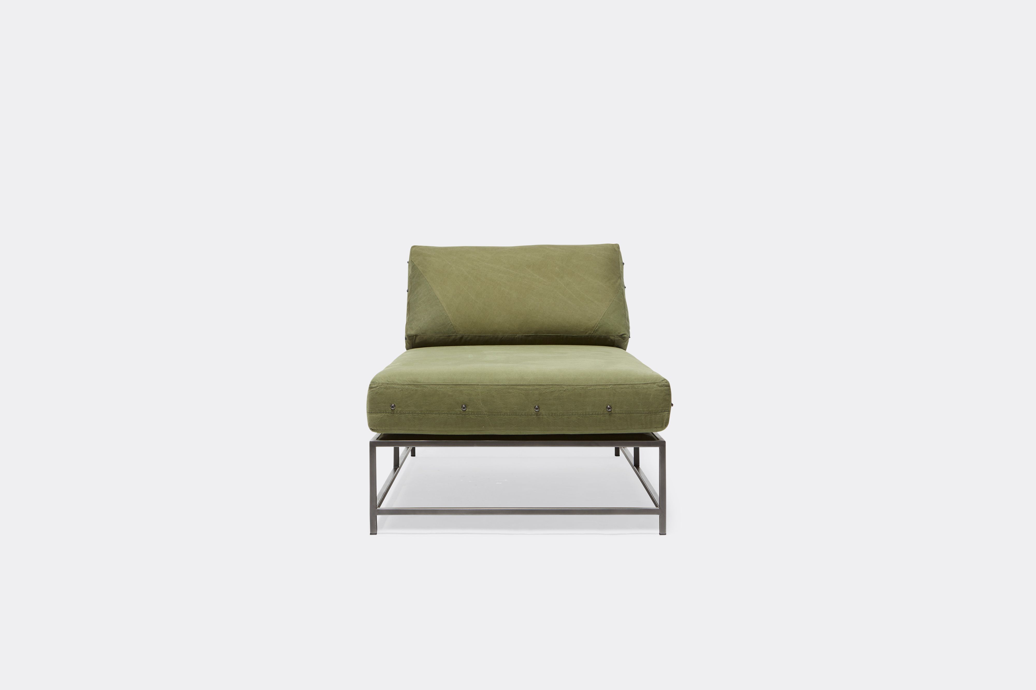 front view of military canvas chaise lounge with blackened steel frame