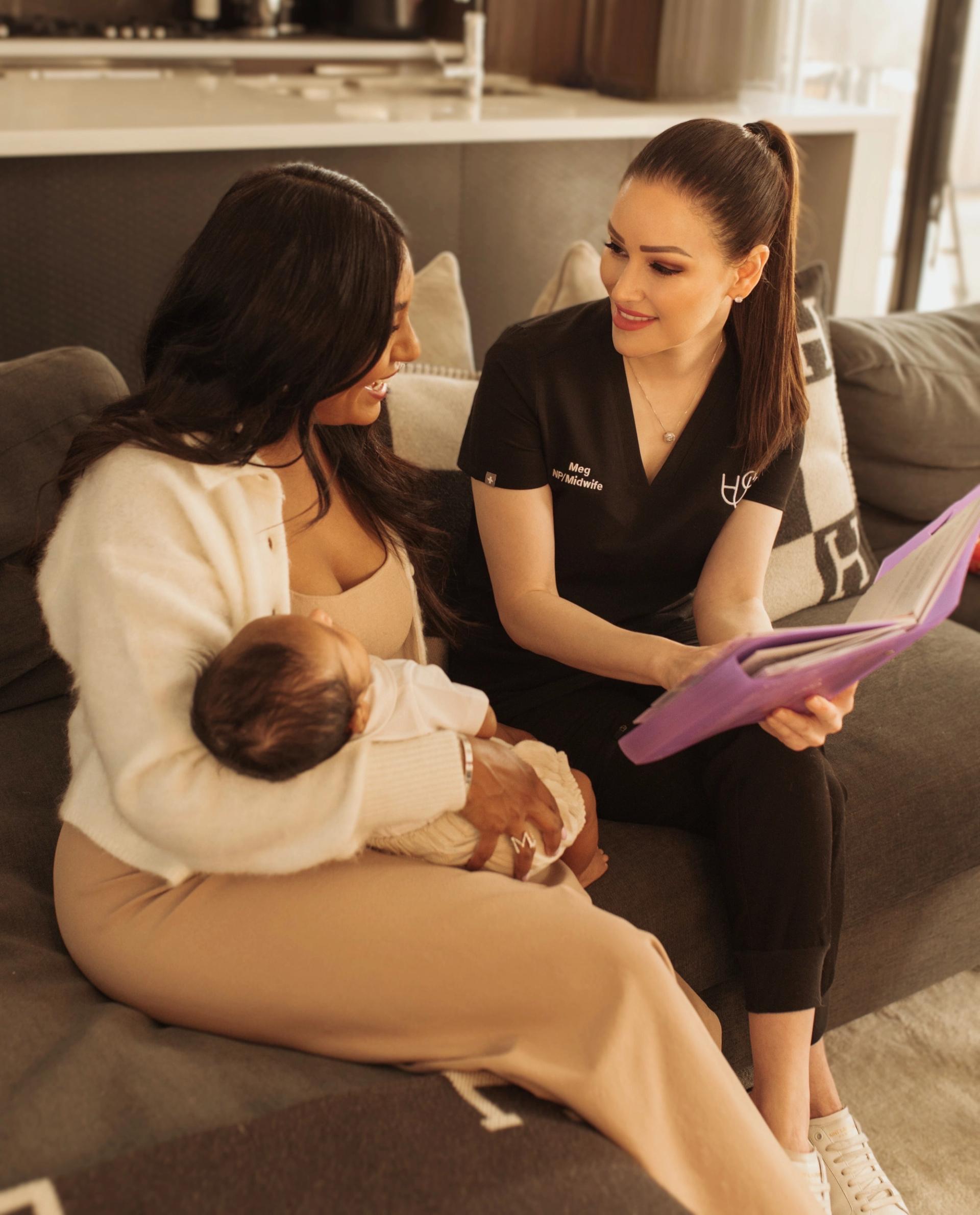 Meg holding newborn baby