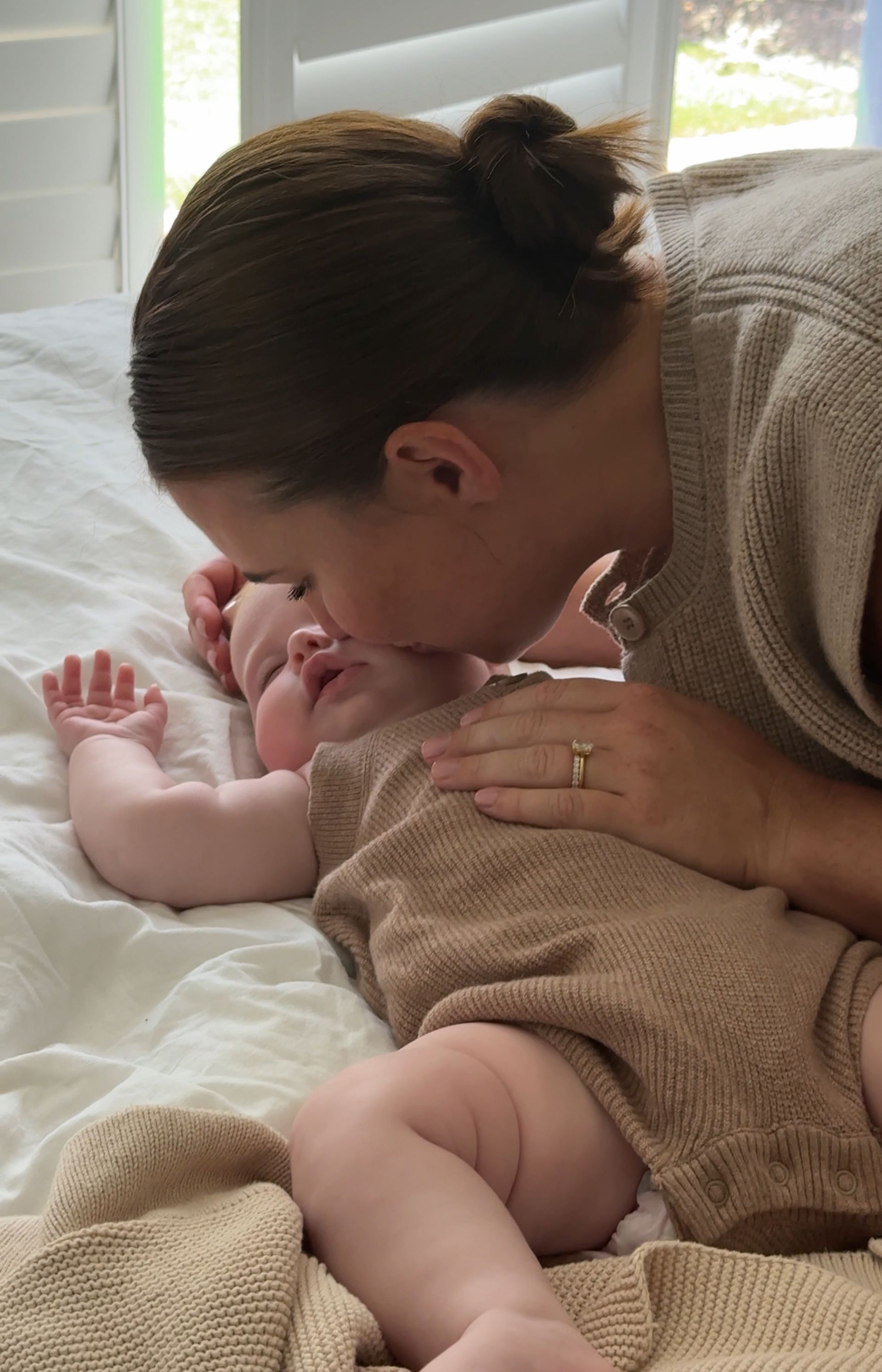 Perth mother holding newborn baby in perth