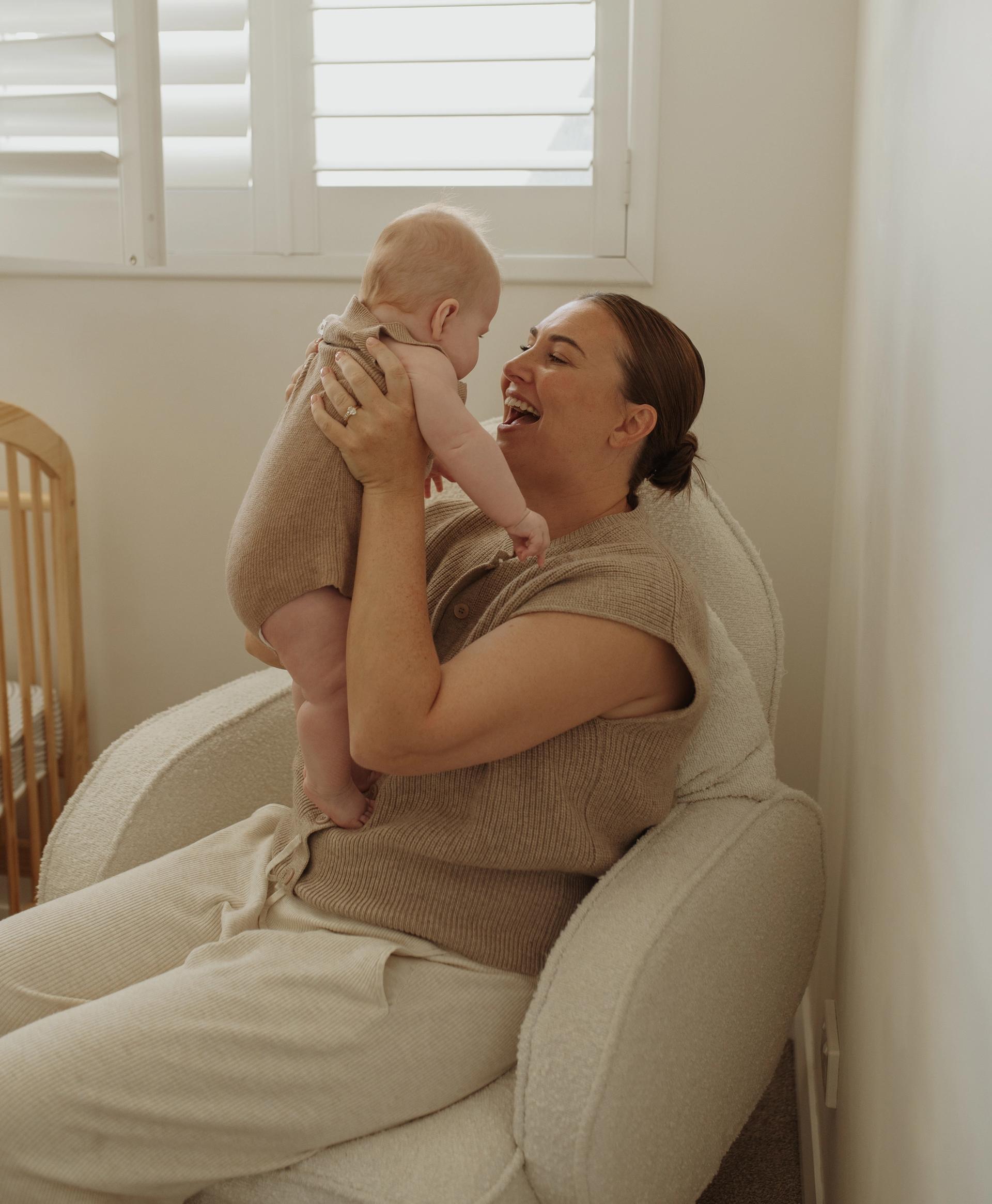 smiling mother and baby 