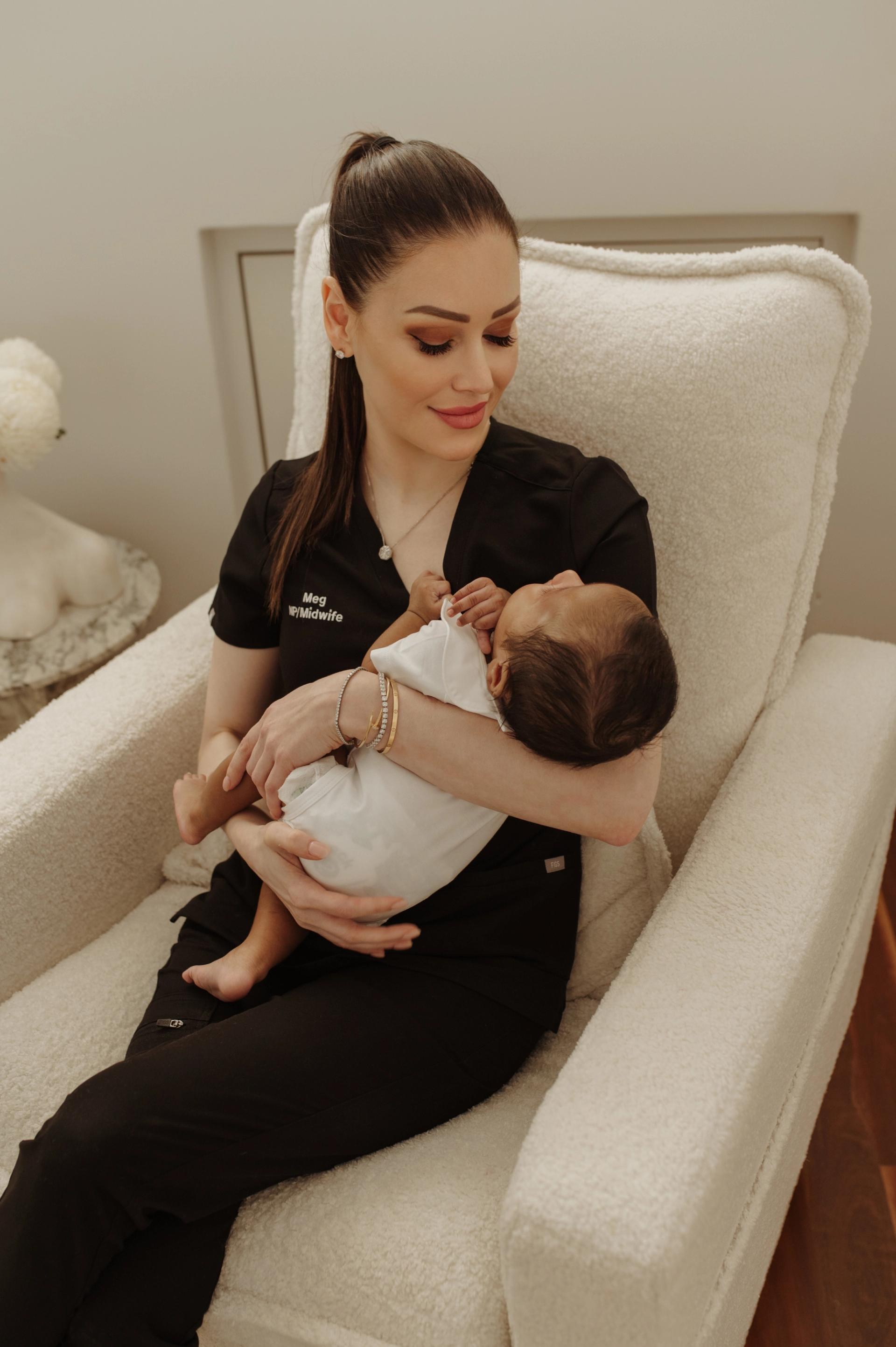 megan holding newborn baby