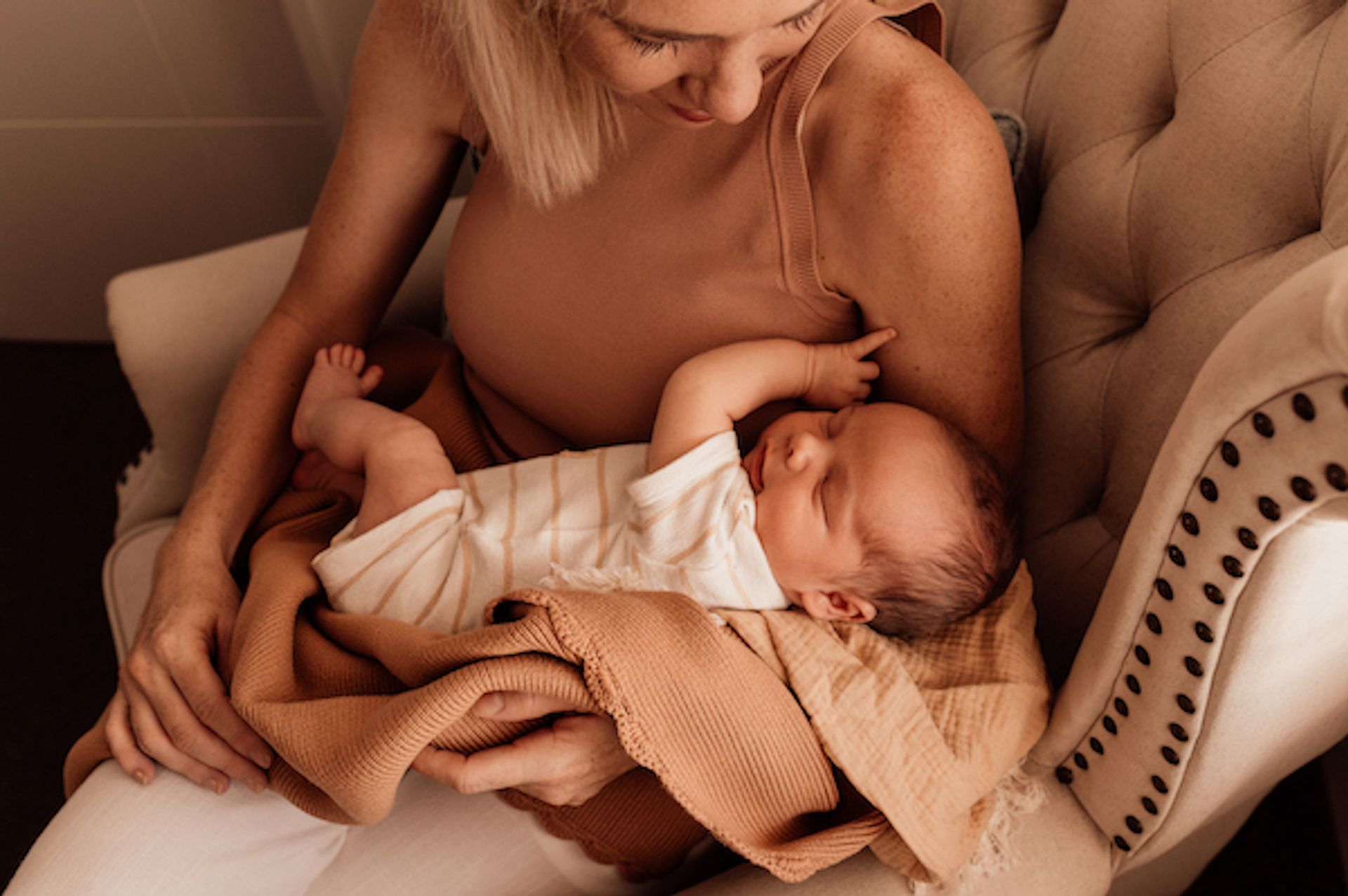 Perth Mother holding newborn baby