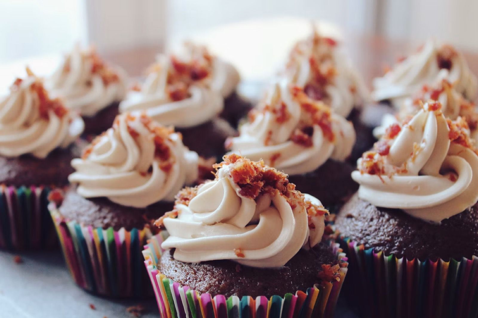 Chocolate cupcakes with swirls of cream frosting