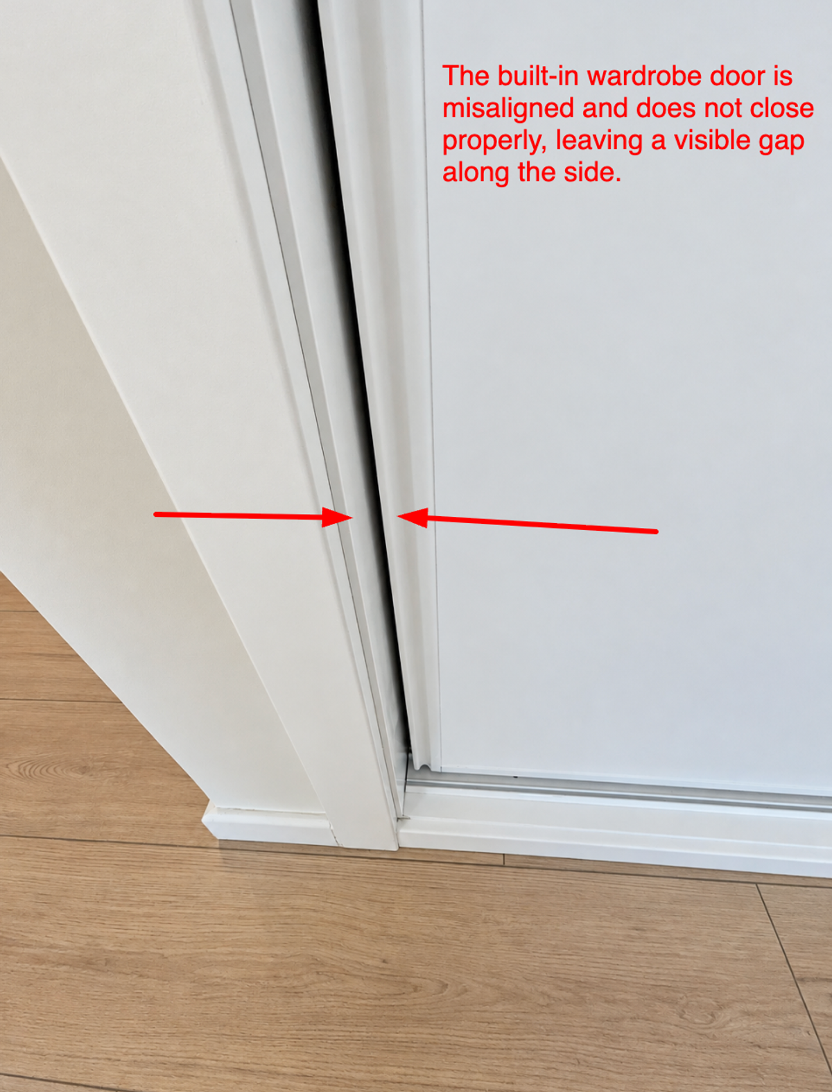 Built-in wardrobe door out of alignment, leaving a gap down the side where it should close.