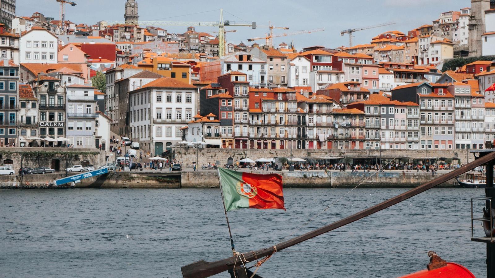 The colorful Ribeira riverfront along the Douro River in Porto, Portugal