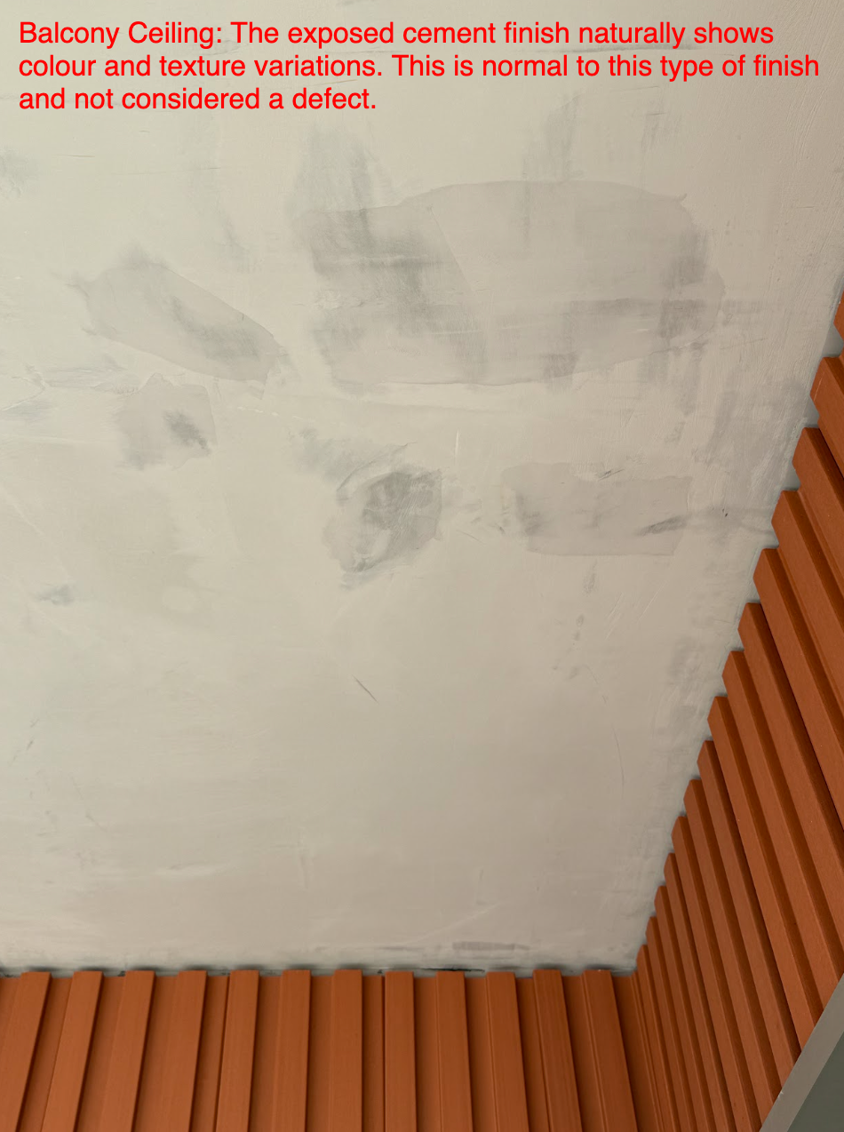 A balcony ceiling in exposed cement, showing the natural colour and texture variation of that finish.