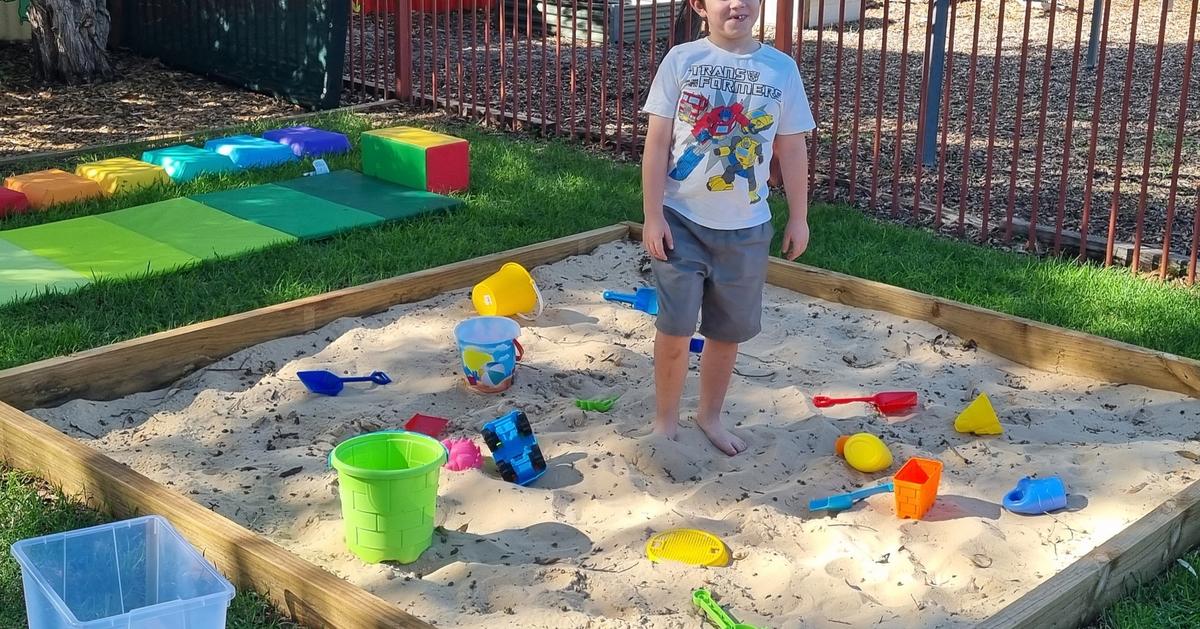 Picture of child in a sandpit