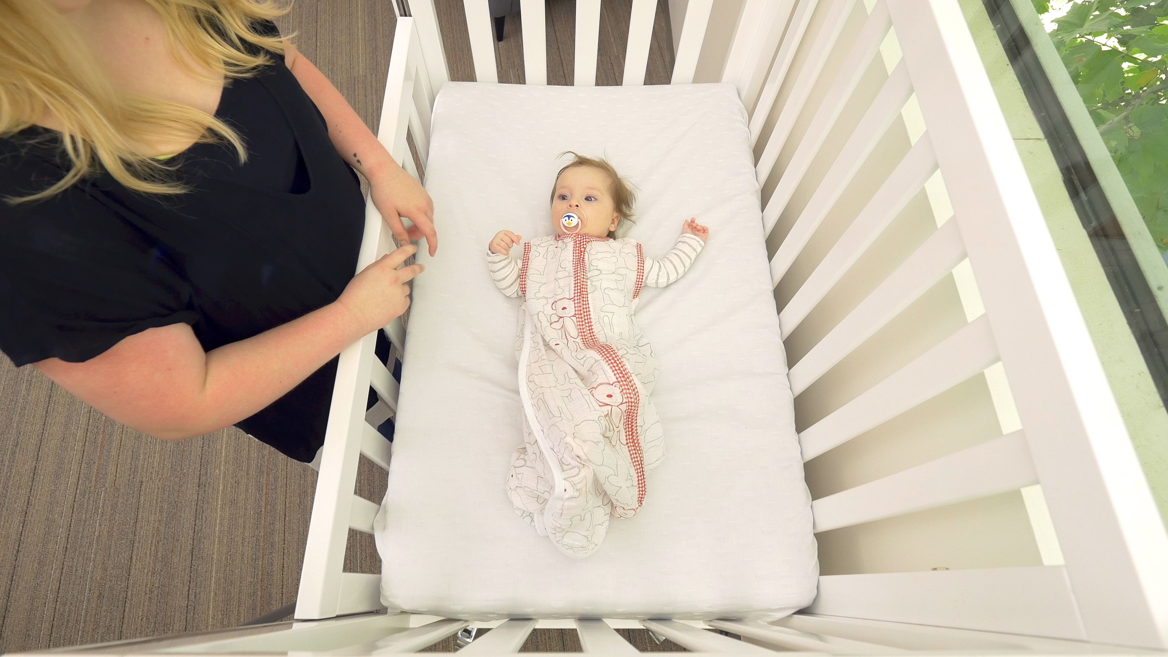 Baby in cot