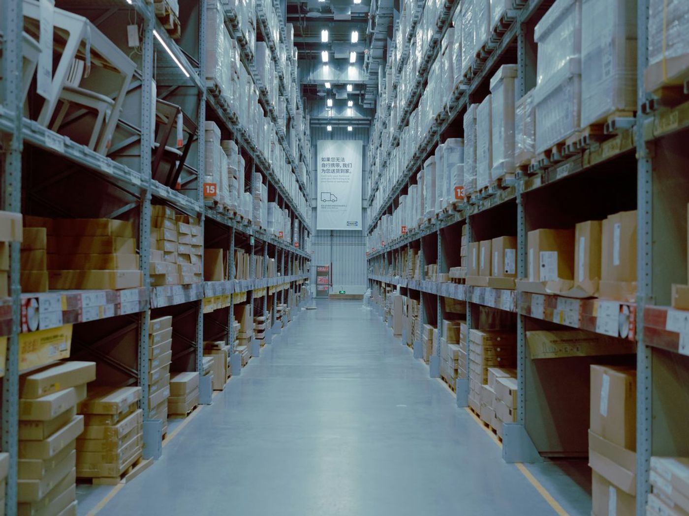 Warehouse aisle with tall racking