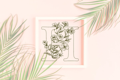 Letter H graphics with floral background