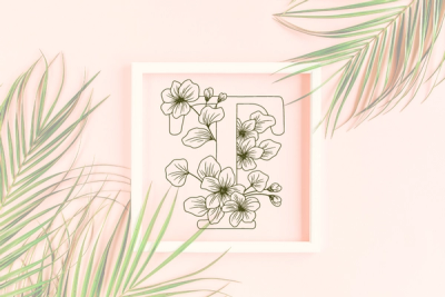 Letter T graphics with floral background