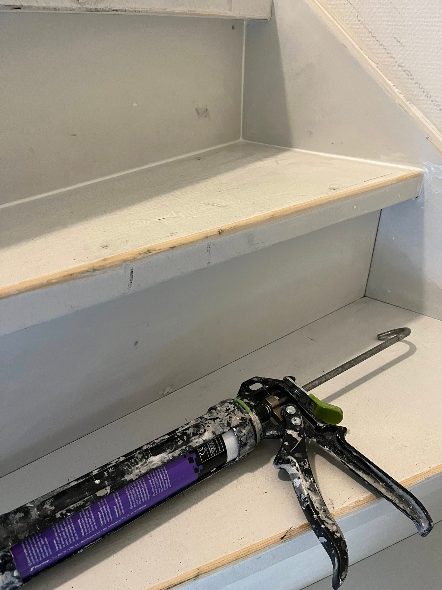 Traprenovatie met schilderwerk en halve manen