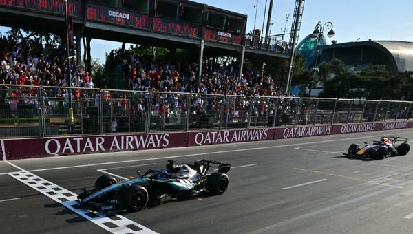 George Russell won a dramatic Azerbaijan Grand Prix on Saturday — race day moved forward due to Azerbaijan's Remembrance Day — fending off Max Verstappen by just 0.196 seconds after two safety cars and a multi-car crash at the restart. Kimi Antonelli climbed from 16th to fifth with a damaged floor. The championship lead remains 66 points with eight rounds to run.